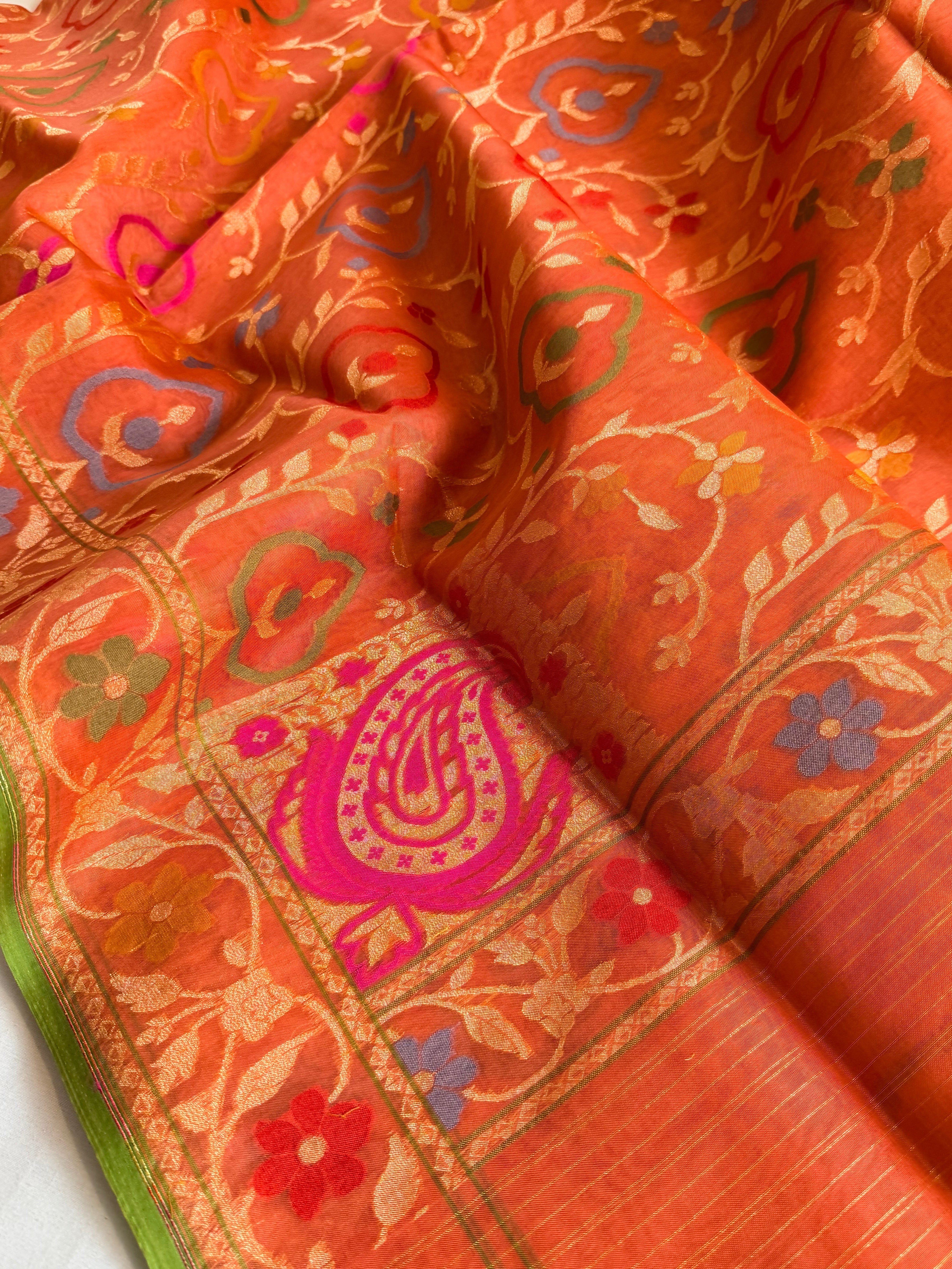 Banarasi kora silk net sunset orange iktara jamdani kadhwa saree