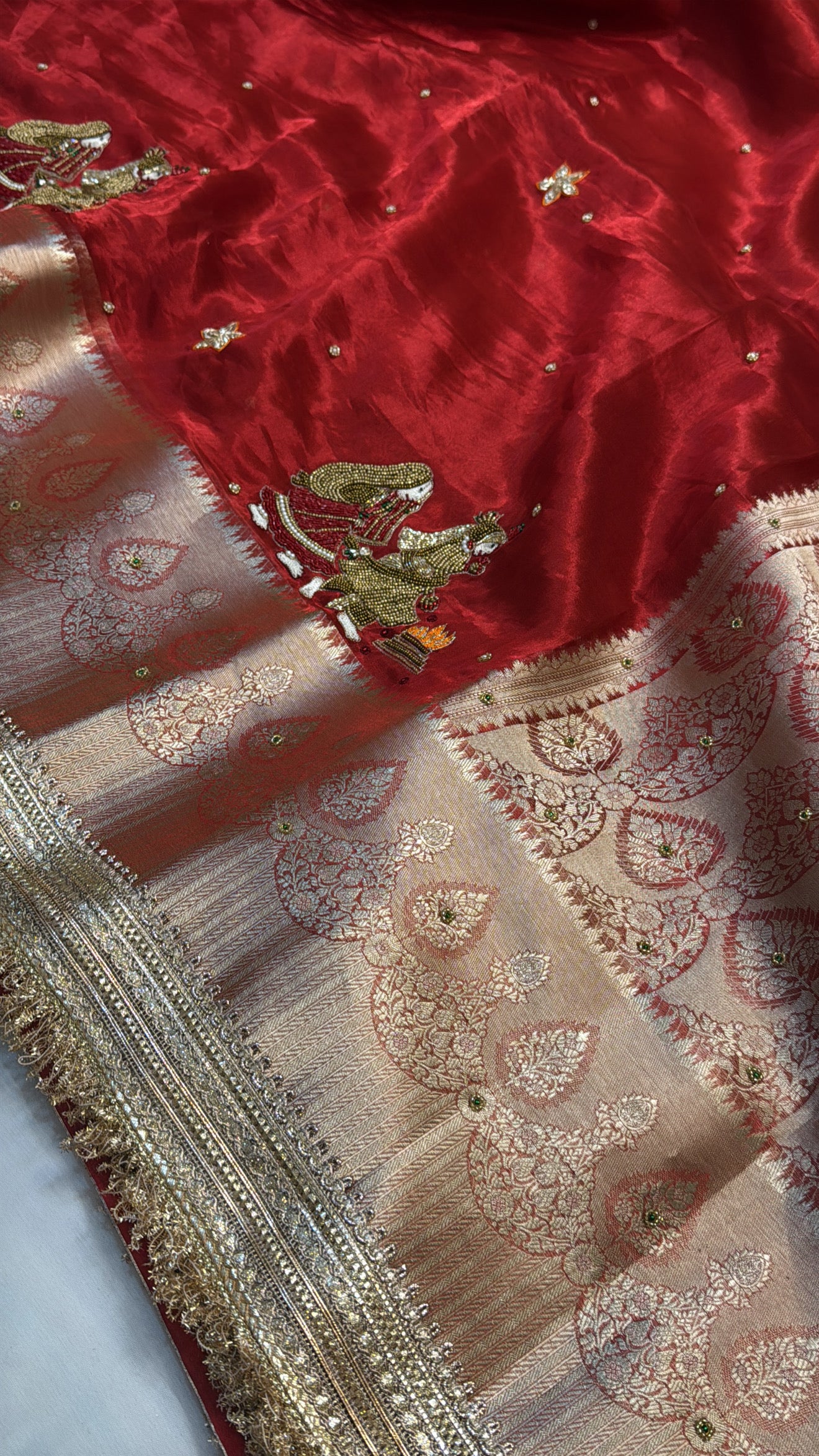 Dulhan ka joda husn red tissue silk hand embroidered saree