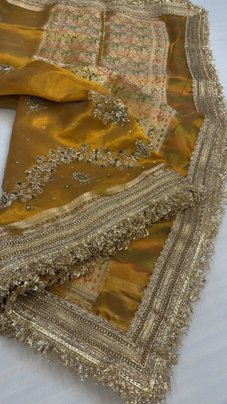 Husn mustard gold tissue silk heavy hand embroidered saree