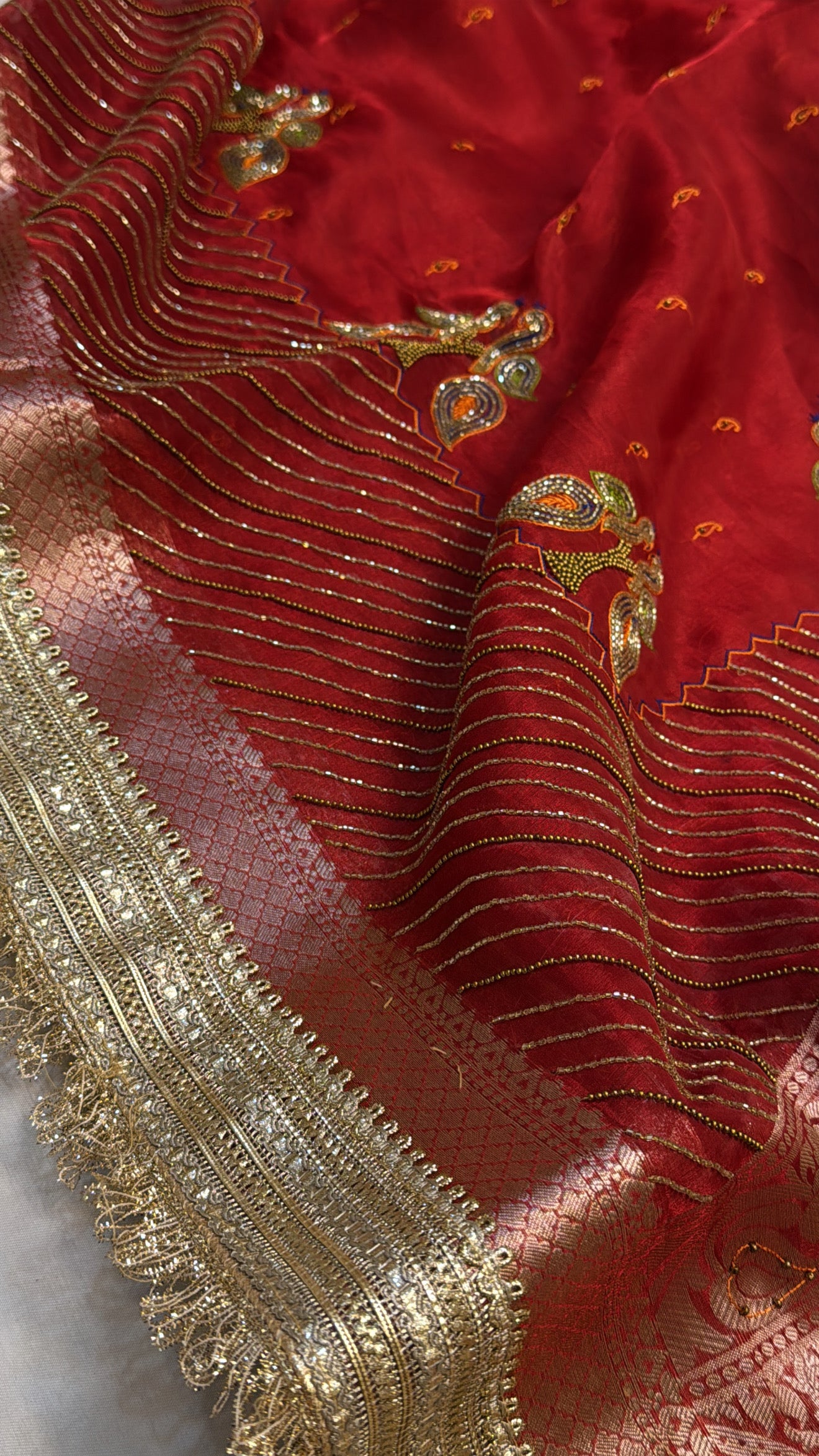 Dulhan ka joda husn red tissue silk hand embroidered saree