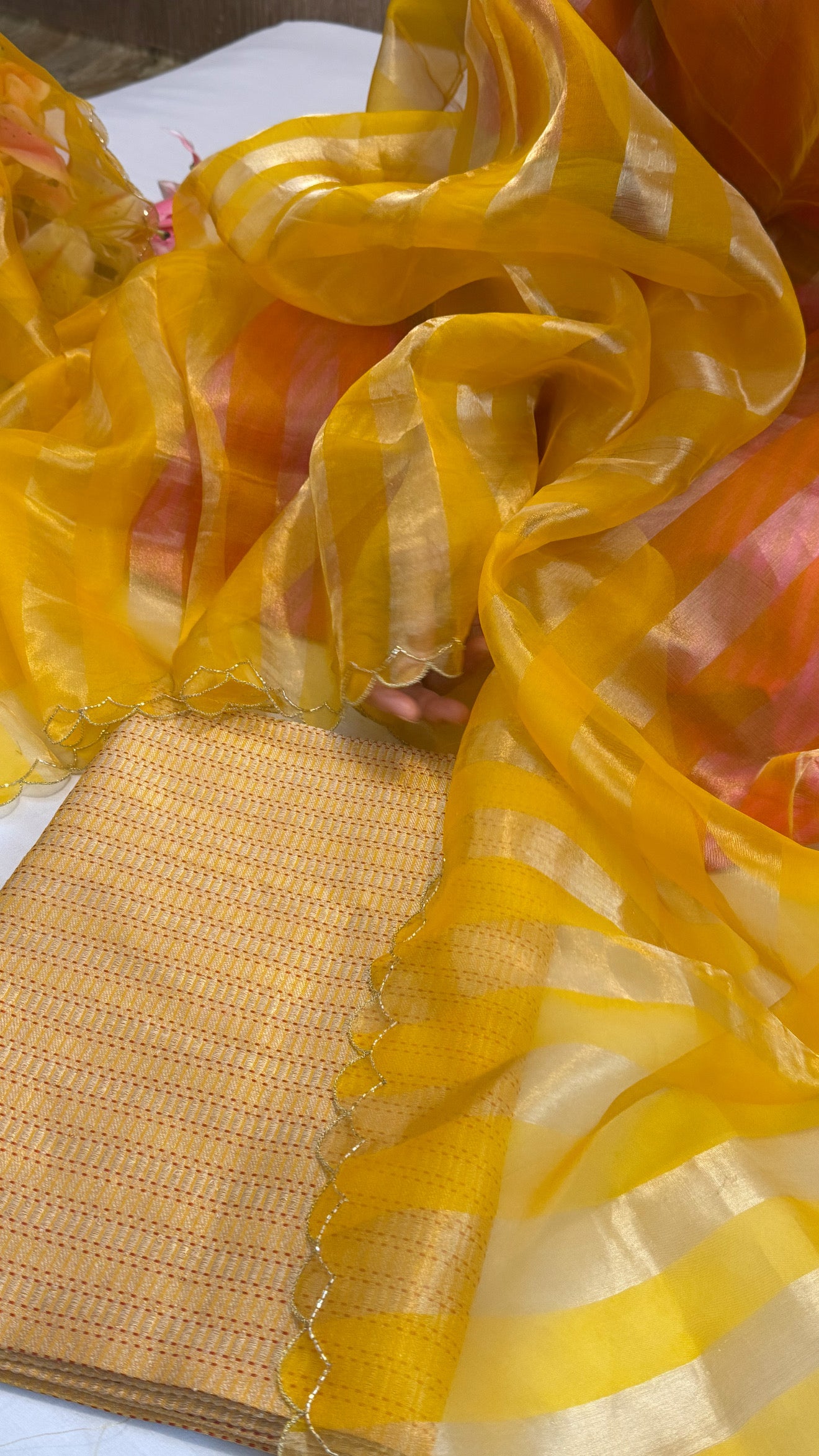 Haldi yellow katan silk brocade kurta paired with kora tissue scalloped striped duppata set