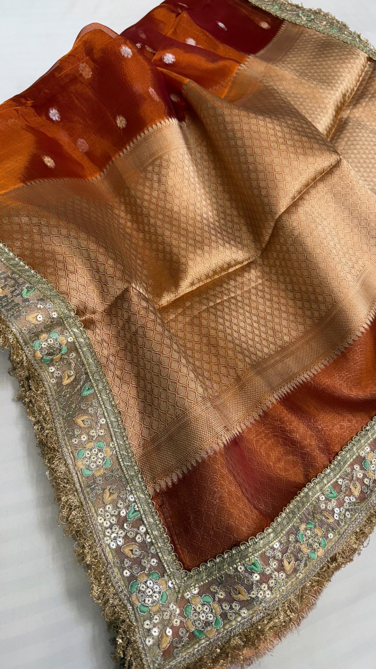 Maharani deep orange tissue silk kadhwa buti saree