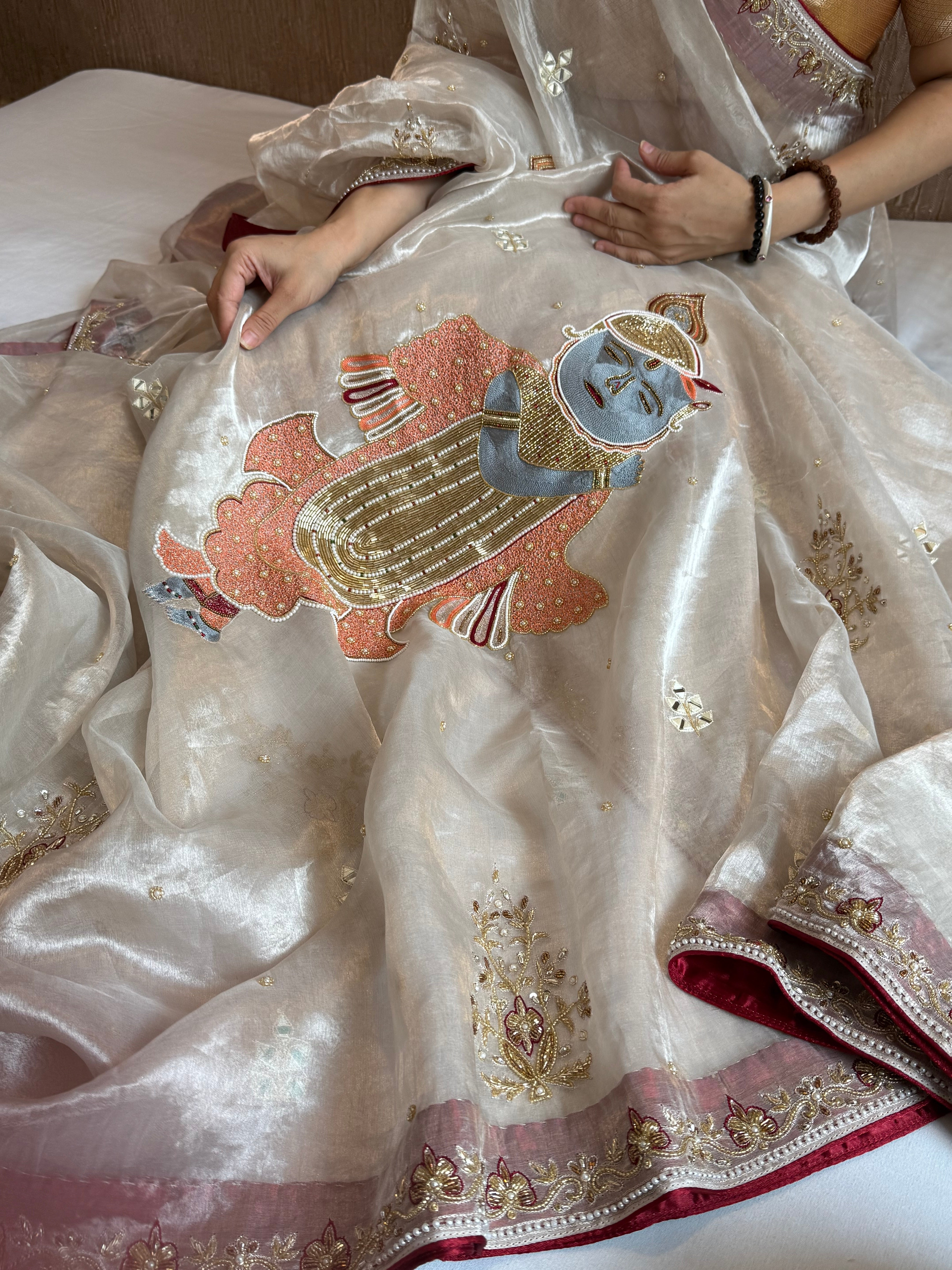 Radhika merchant inspired shreenathji motif diamond tissue silk hand embroidered saree