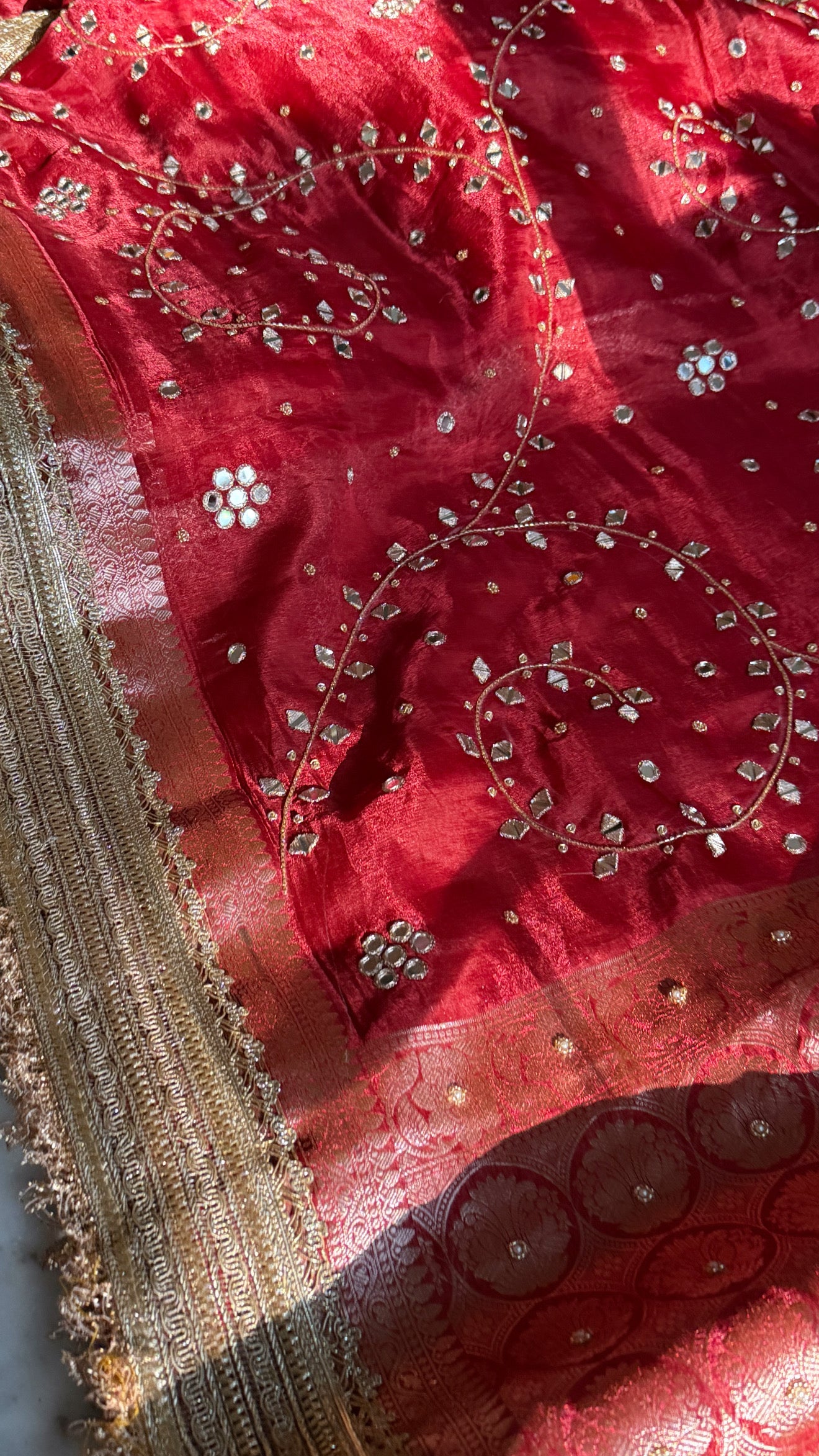 Teej special - Crimson red mirror work tissue silk jaal hand embroidered saree