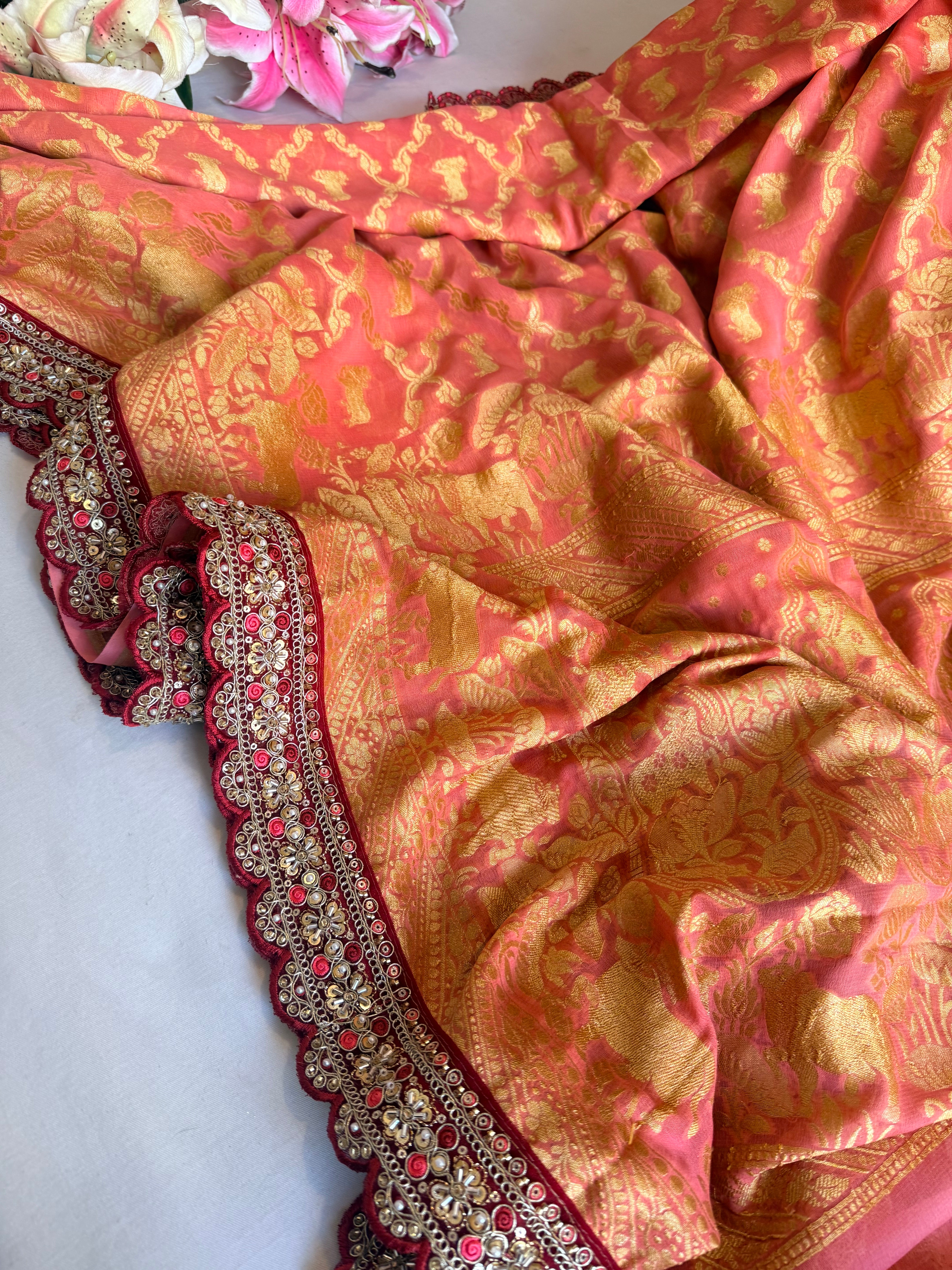 Peachy pink shikargah kadhwa border chiffon gorgette banarasi saree