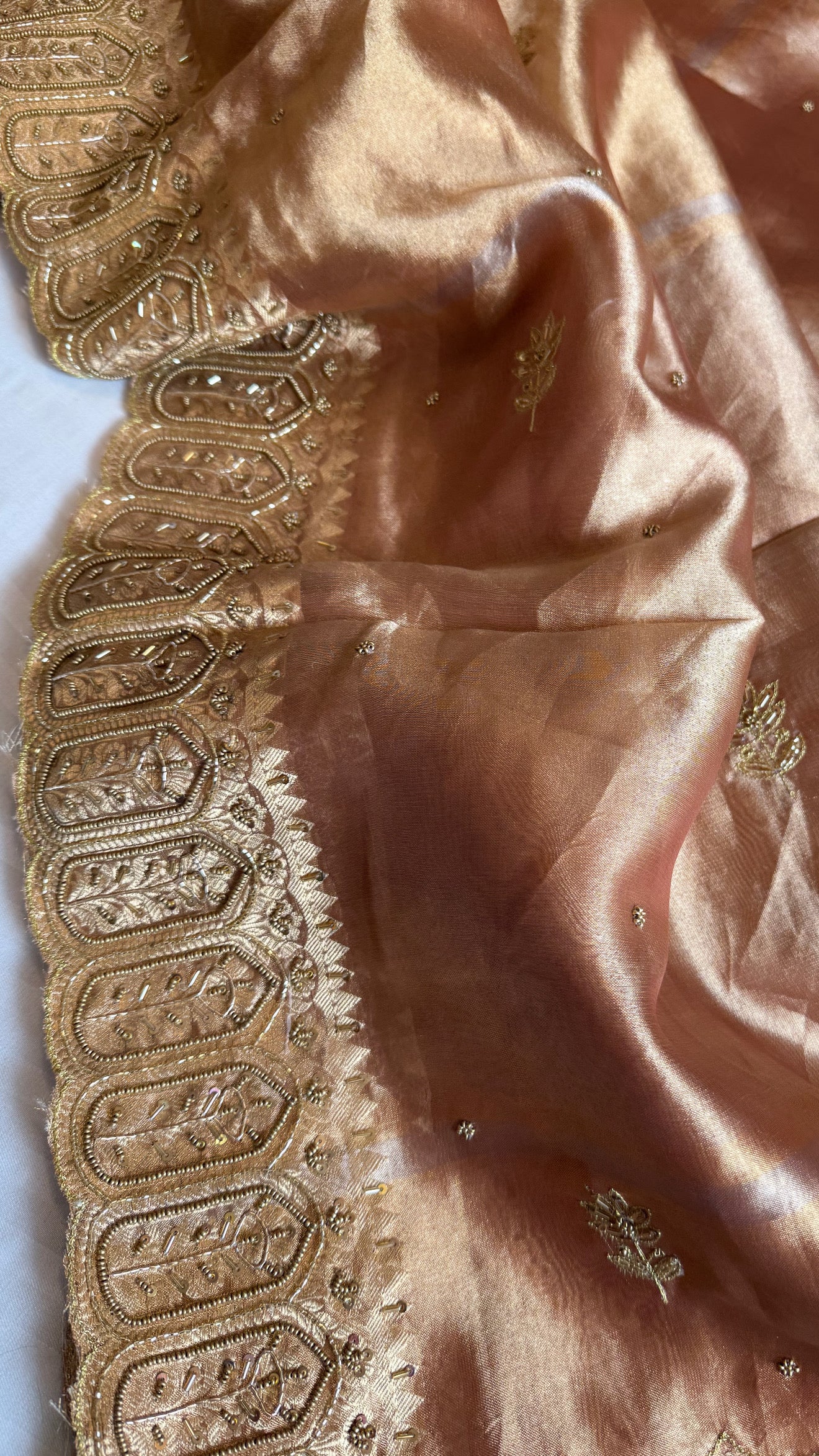 Husn kanjivaram peach tissue silk heavy hand embroidered saree