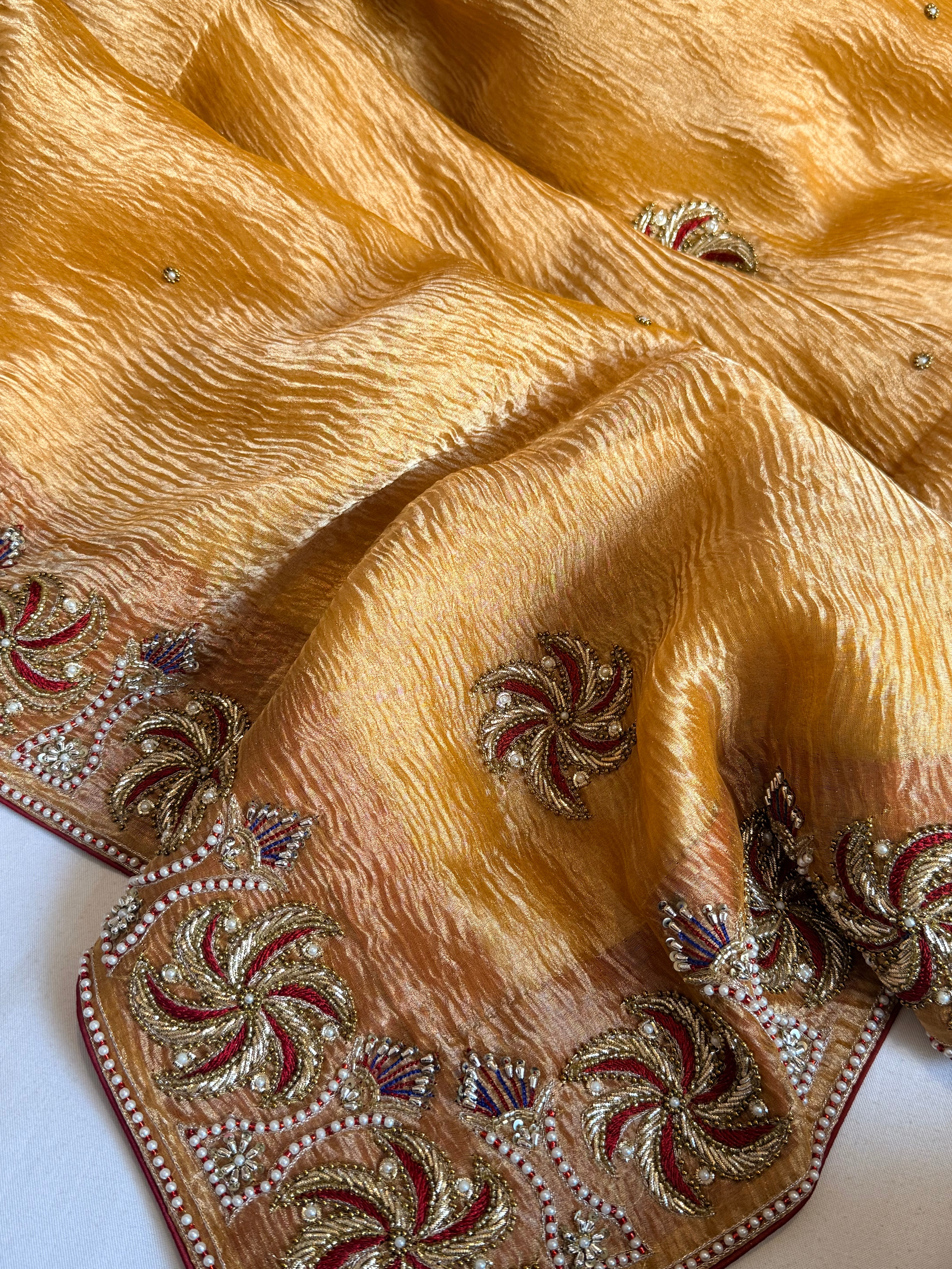 Rajkumari kesari yellow crushed tissue silk zardozi work hand embroidered saree