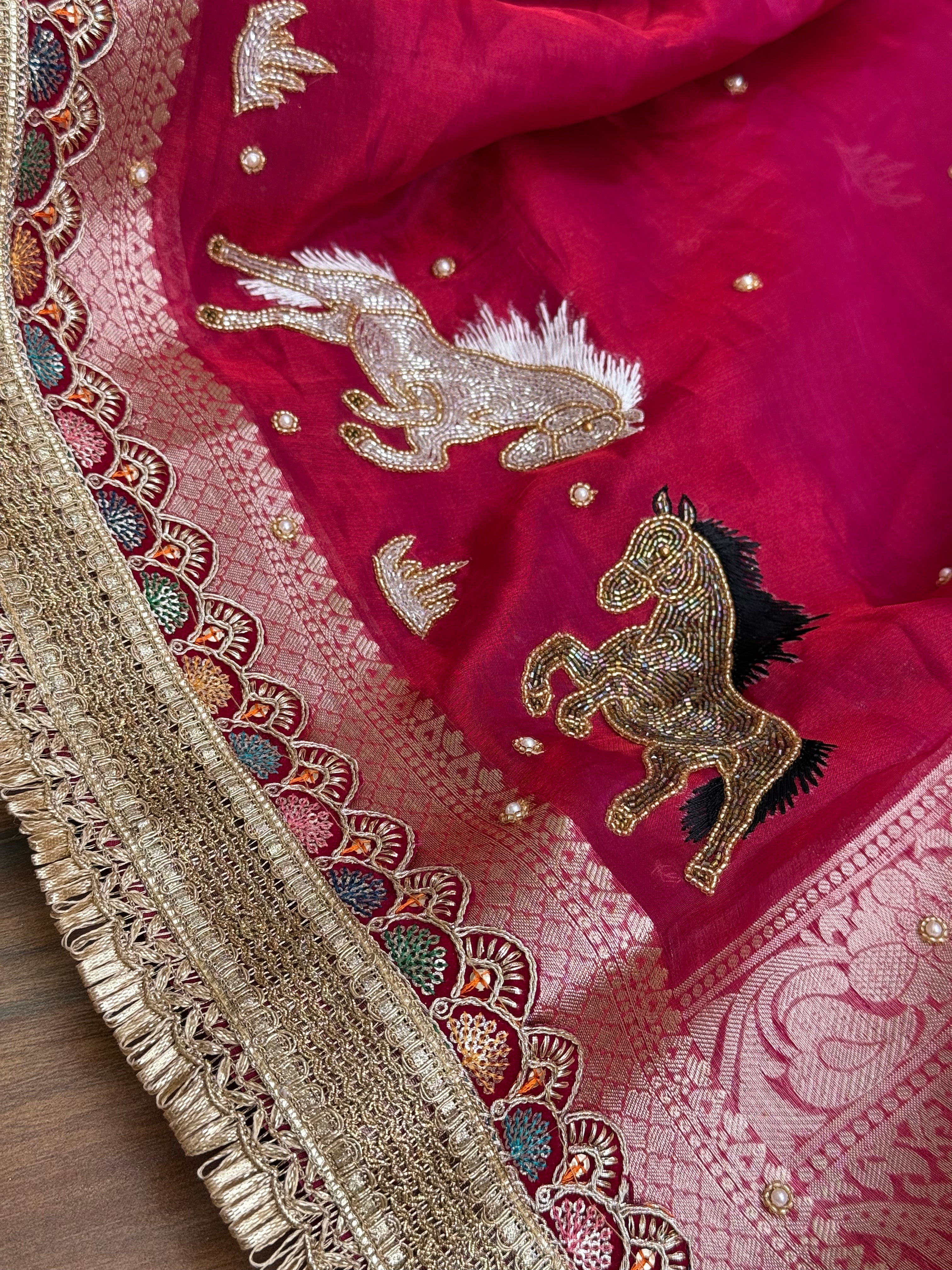 Horse hand embroidered motif cherry pinkish red dhup chao effect tissue silk banarasi gotapatti kadhwa saree