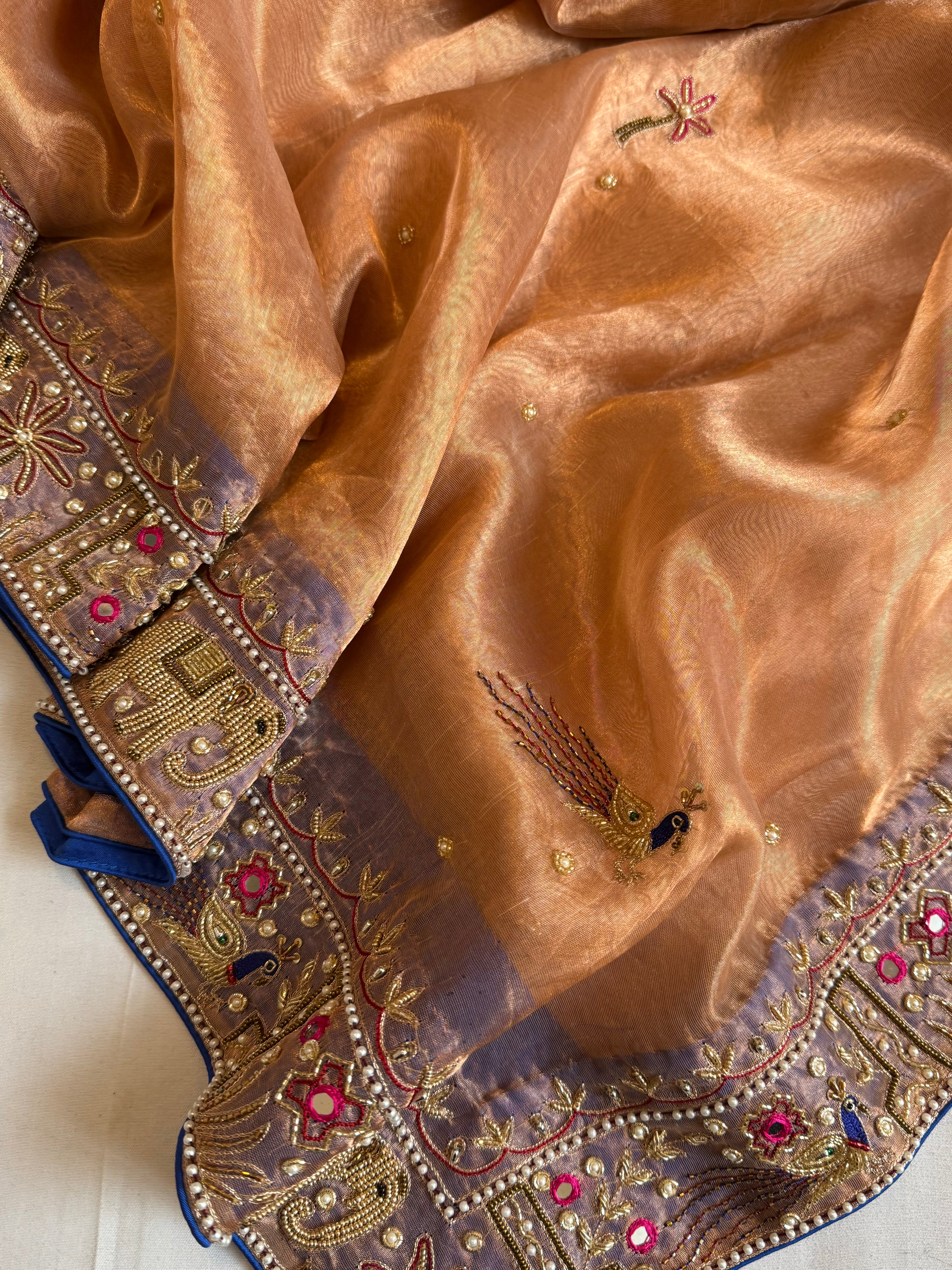 Sheeshmahal shikargah edit - Rose gold tissue silk hand embroidered elephant motif border kadhwa saree