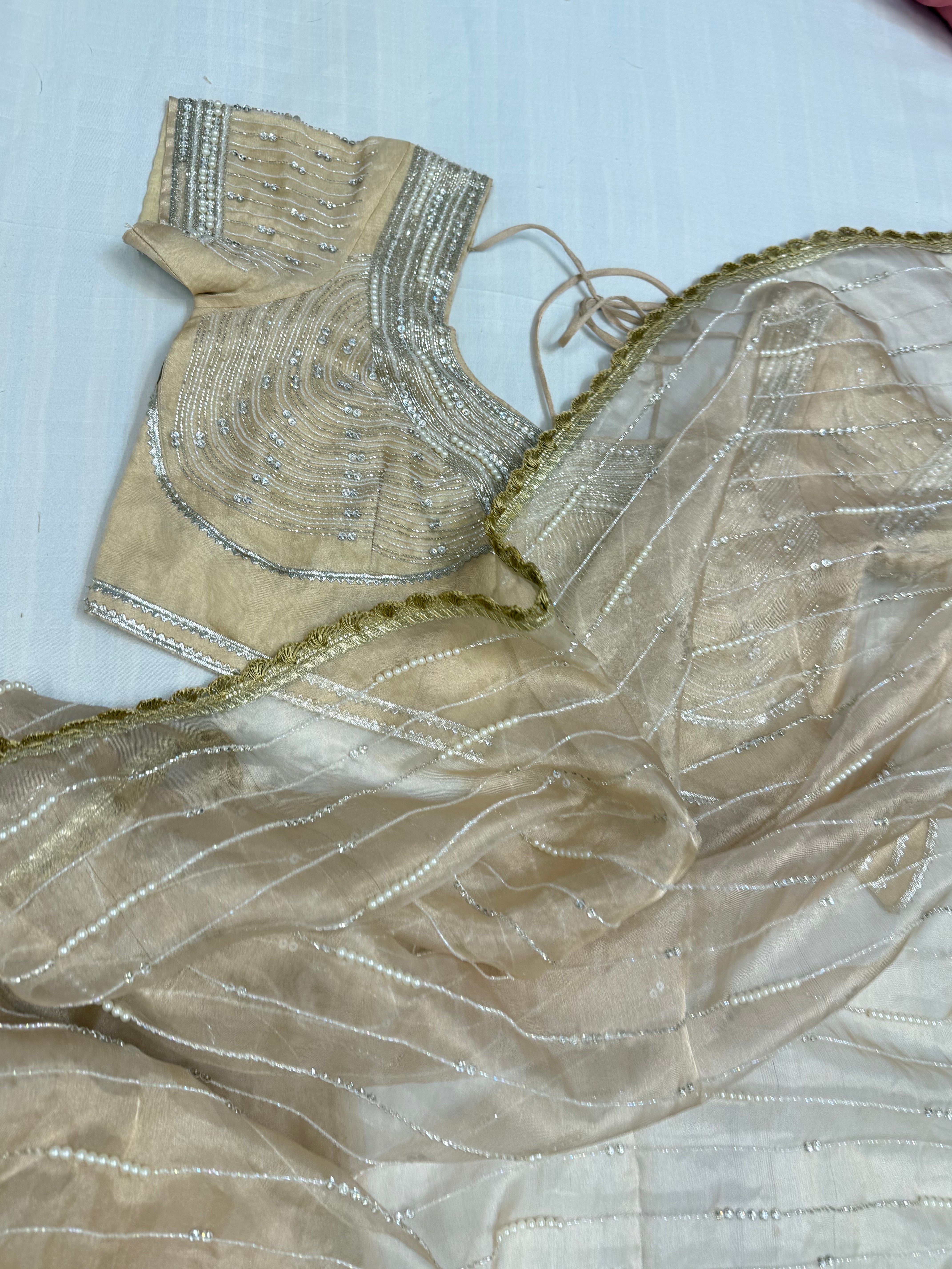 Suhana khan inspired golden pearl work heavy hand embroidered tissue silk saree