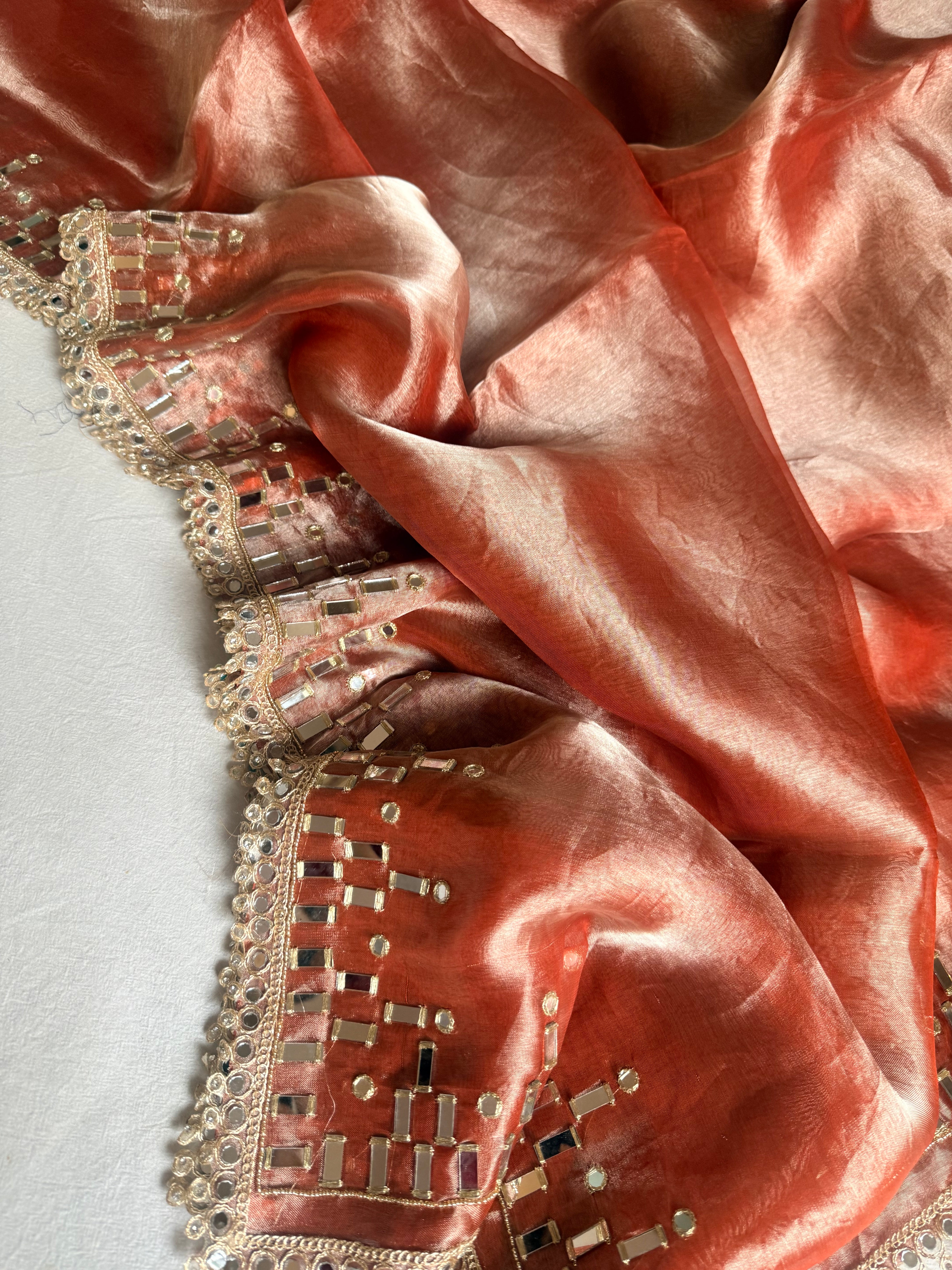 Gajri peach tissue silk mirrorwork hand embroidered kadhwa saree