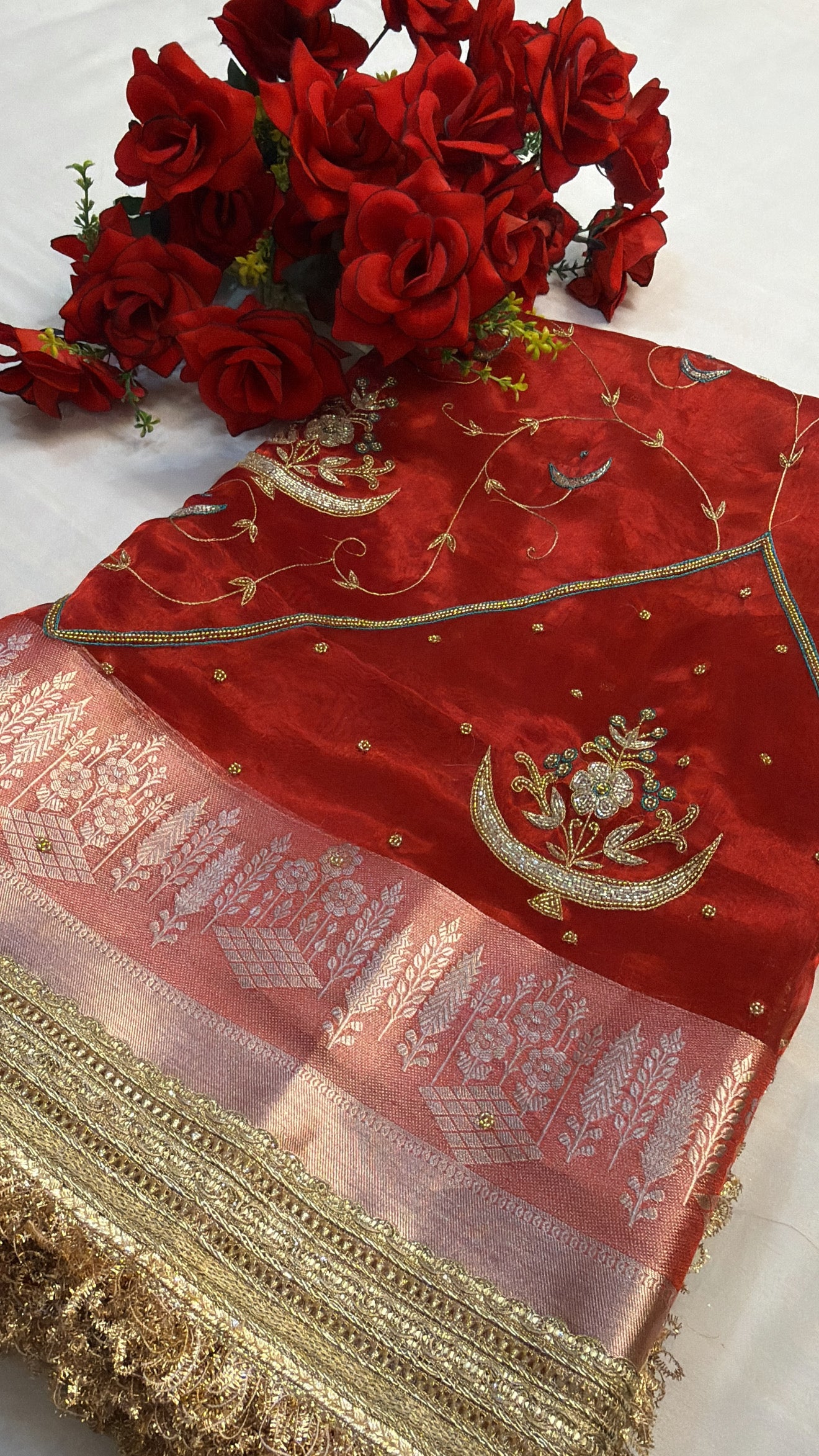 Dulhan ka joda husn red tissue silk hand embroidered saree