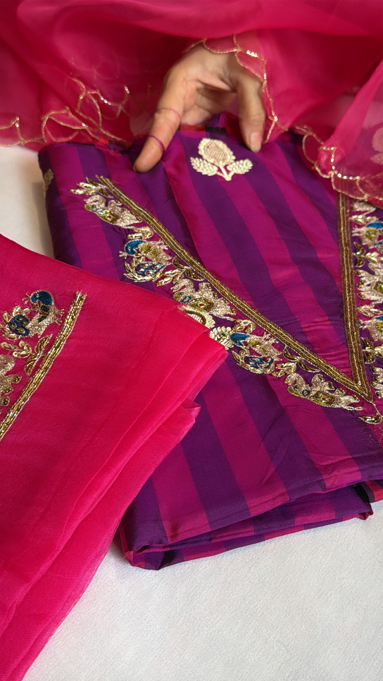 Magenta purple-pink katan silk striped dhup chao effect kurta paired with Kora silk scalloped duppata set