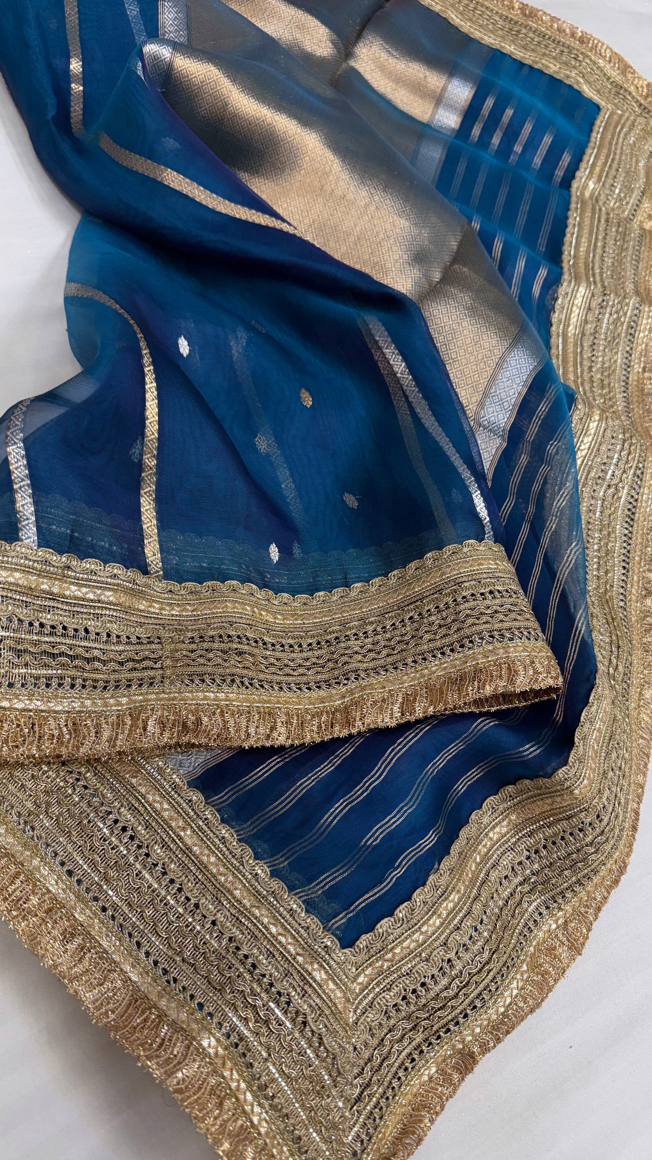 Maharani aqua blue tissue silk kadhwa buti saree