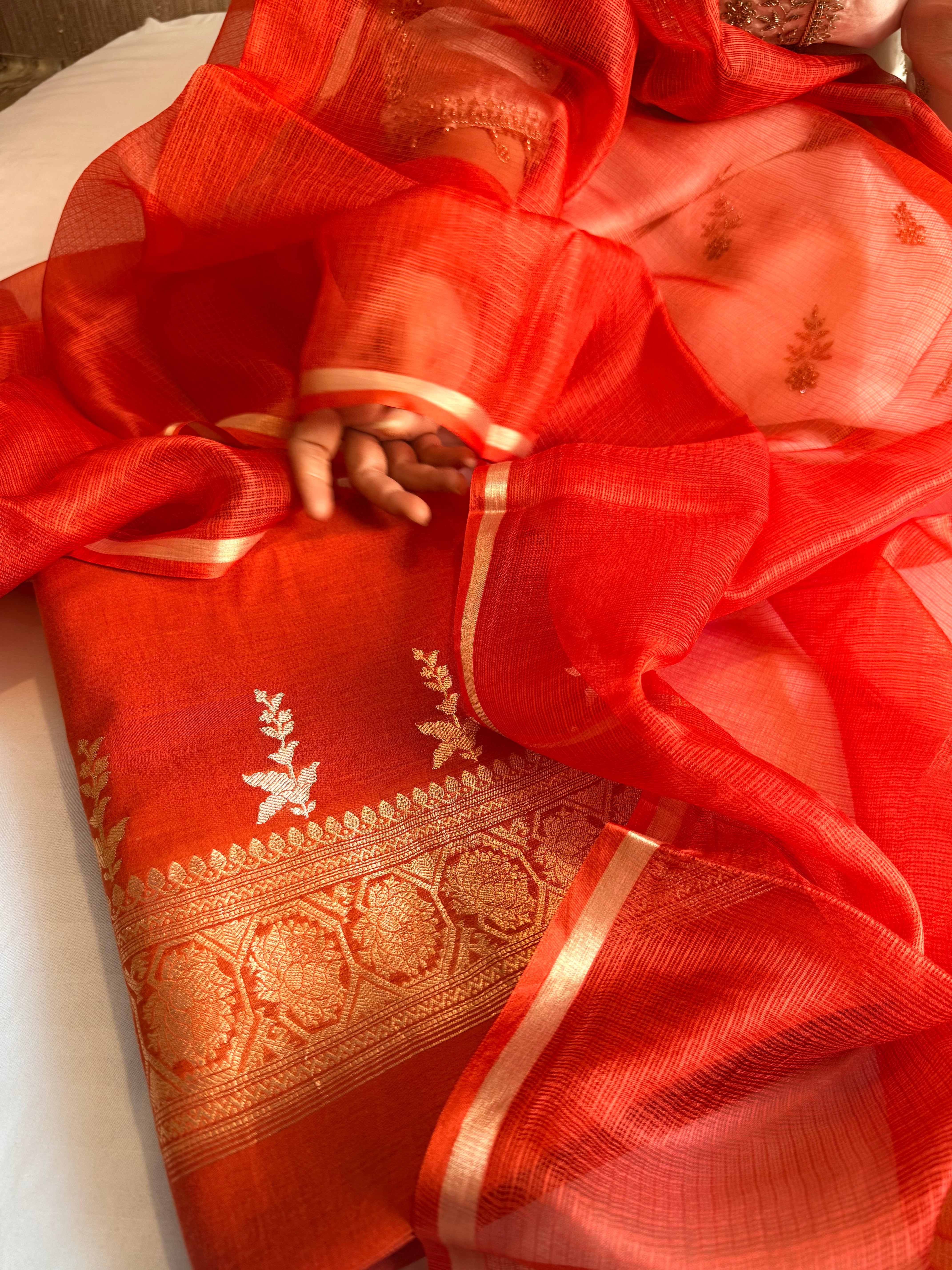 Rust red mul cotton kadhwa buti kurta paired with kora silk net duppata set