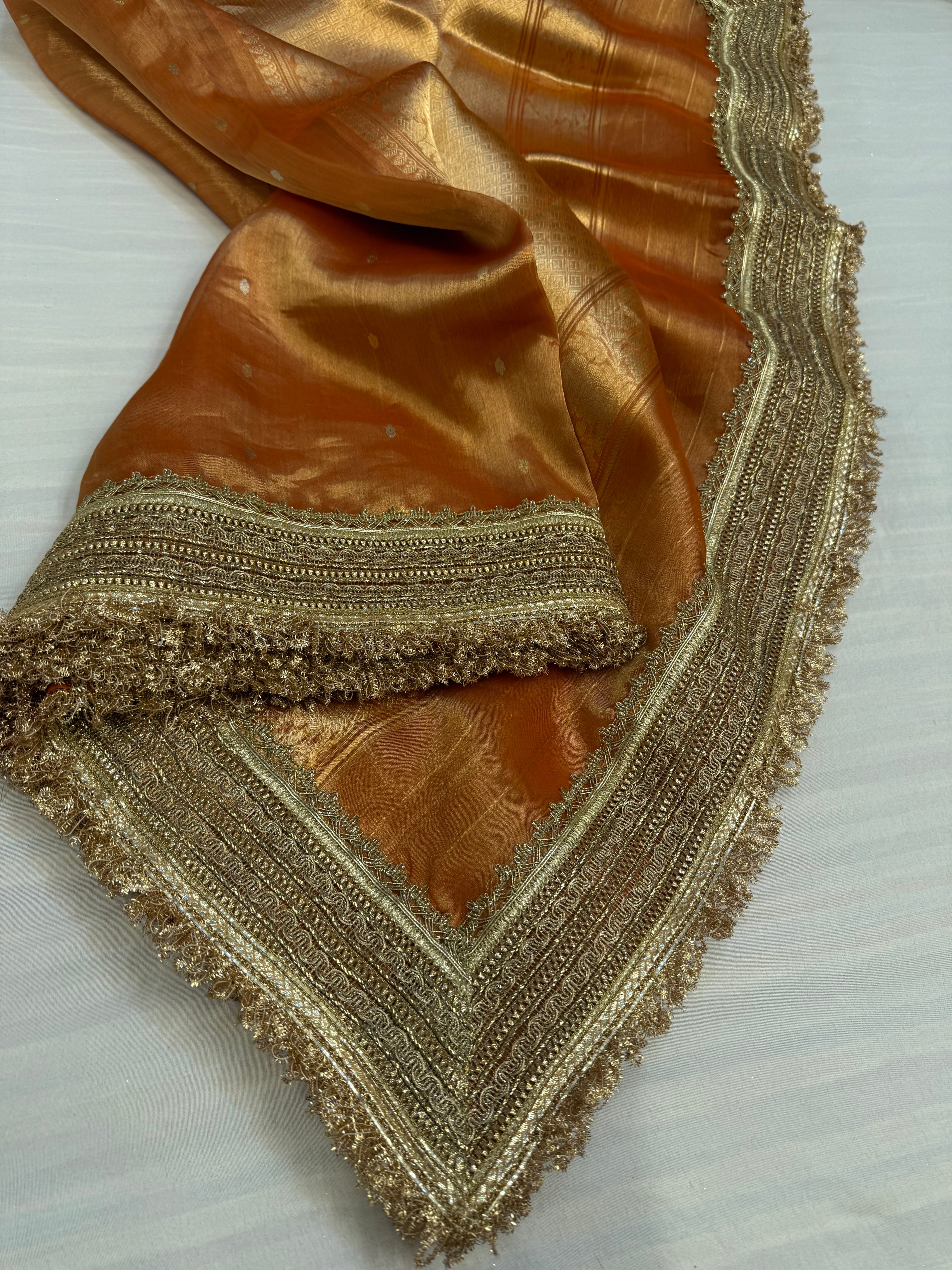 Fanta orange maharani tissue silk kadhwa buti saree