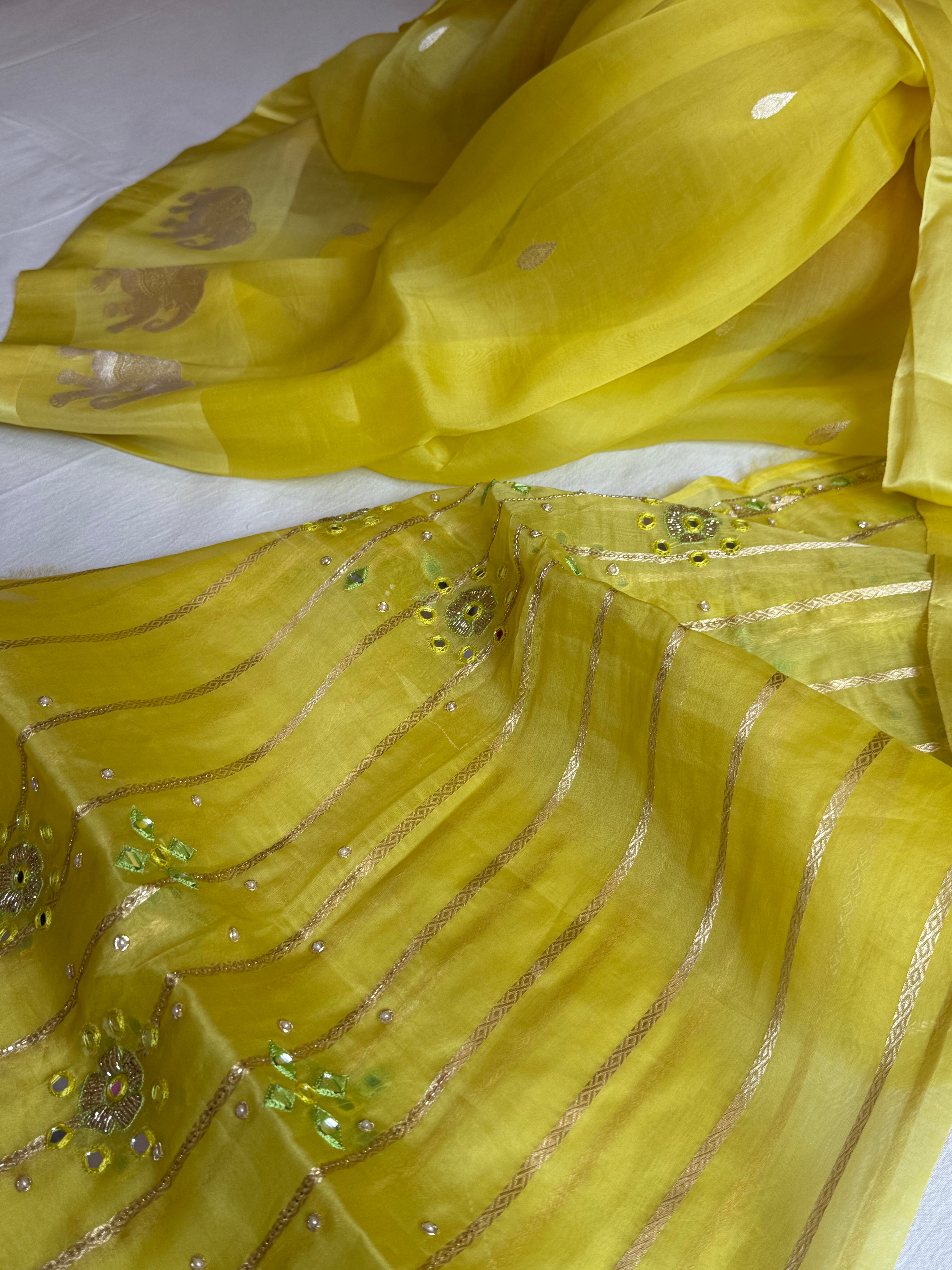 Lemon yellow banarasi kora silk hand embroidered saree
