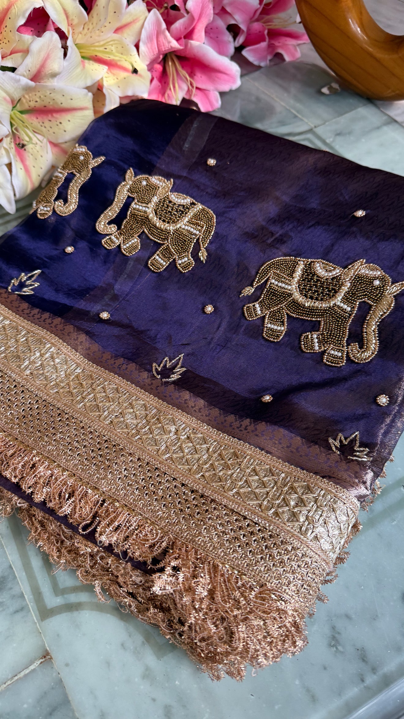 Husn midnight blue tissue silk hand embroidered elephant motif saree