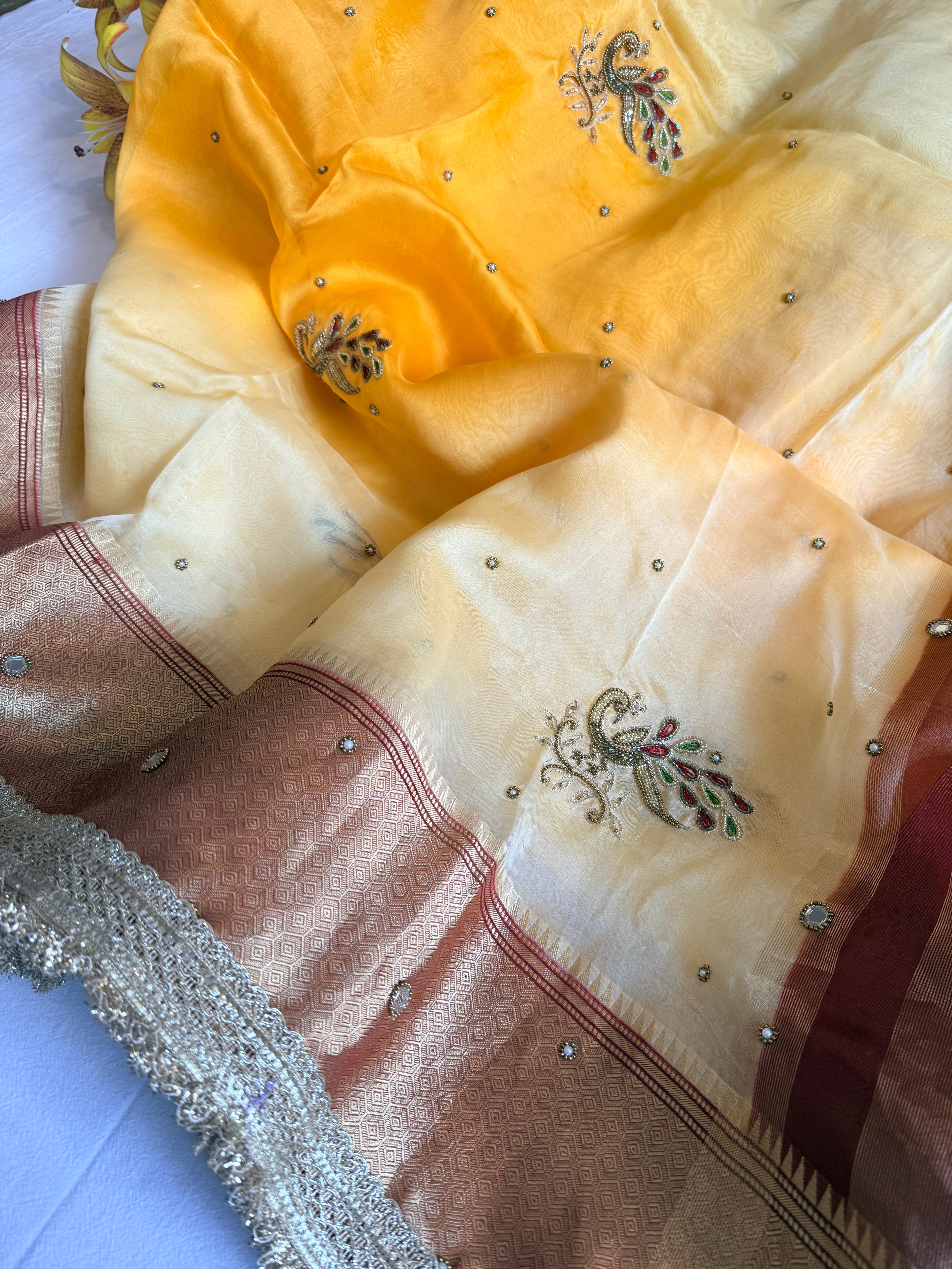 Husn ganga jamuna contrast border kora silk hand embroidered saree