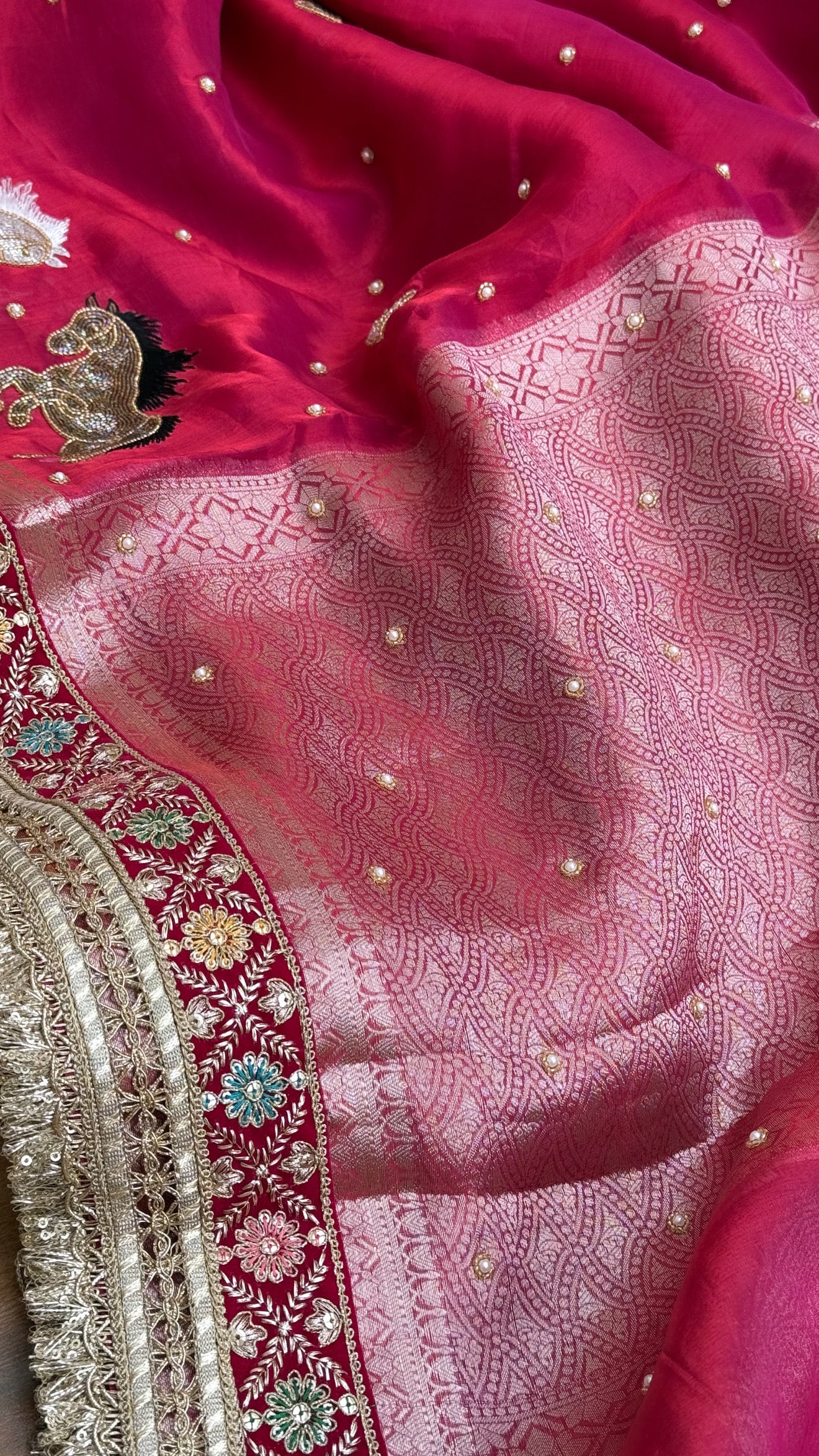 Horse hand embroidered motif cherry pinkish red dhup chao effect tissue silk banarasi gotapatti kadhwa saree