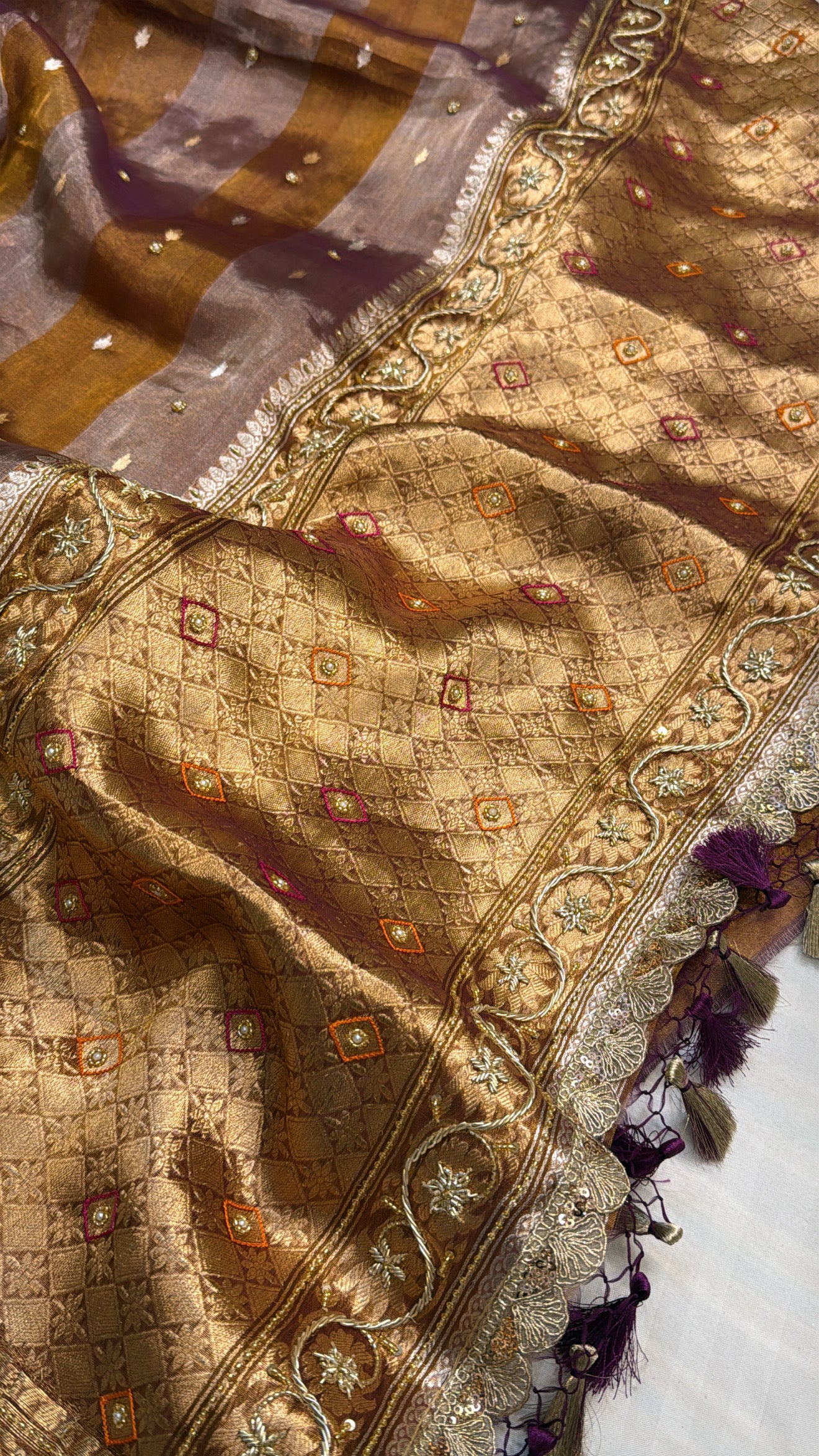 Kanjivaram peach tissue silk striped hand embroidered kadhwa saree