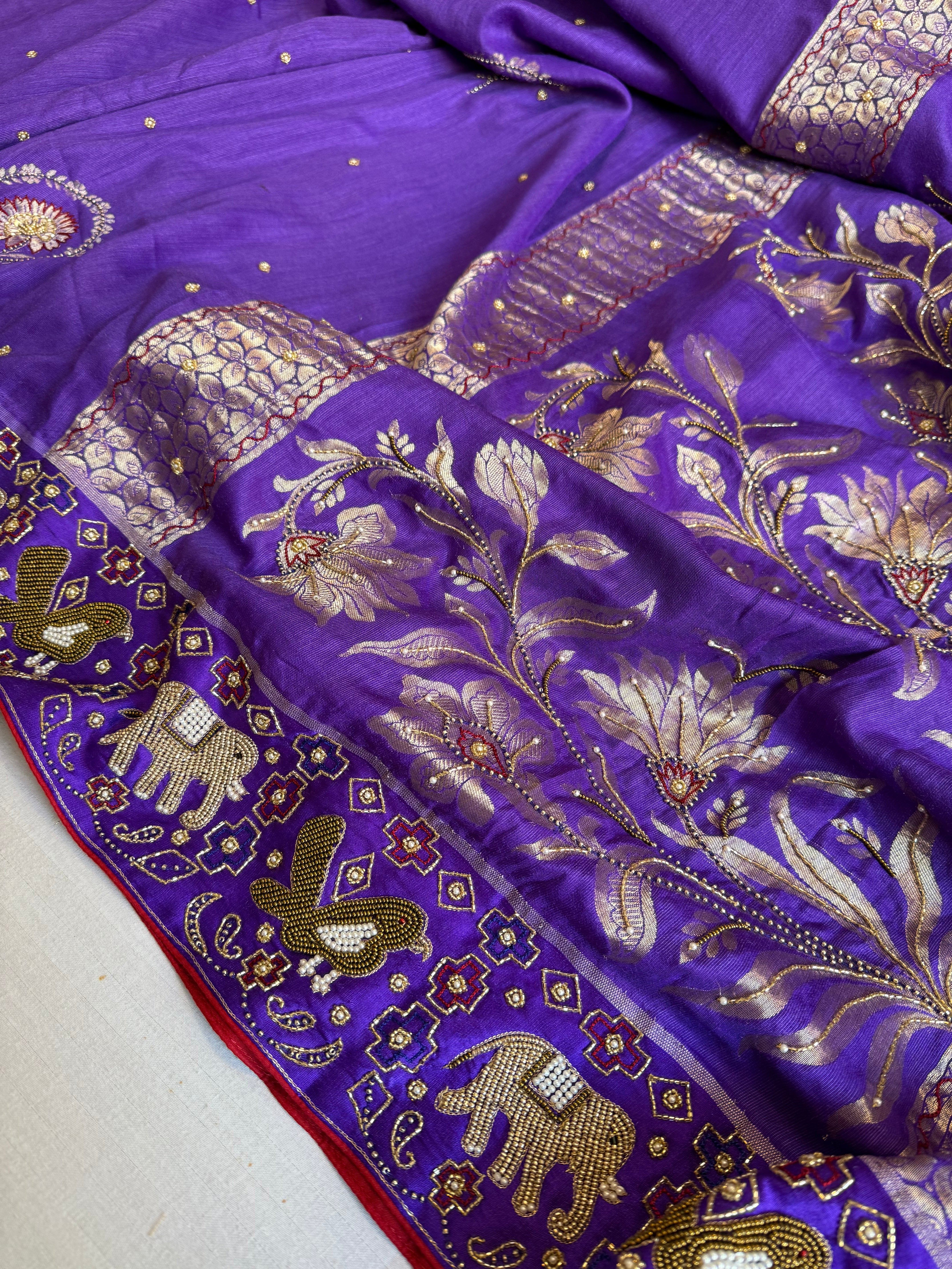 Moonga silk ikkat patola weaving inspired hand embroidered kadhwa saree