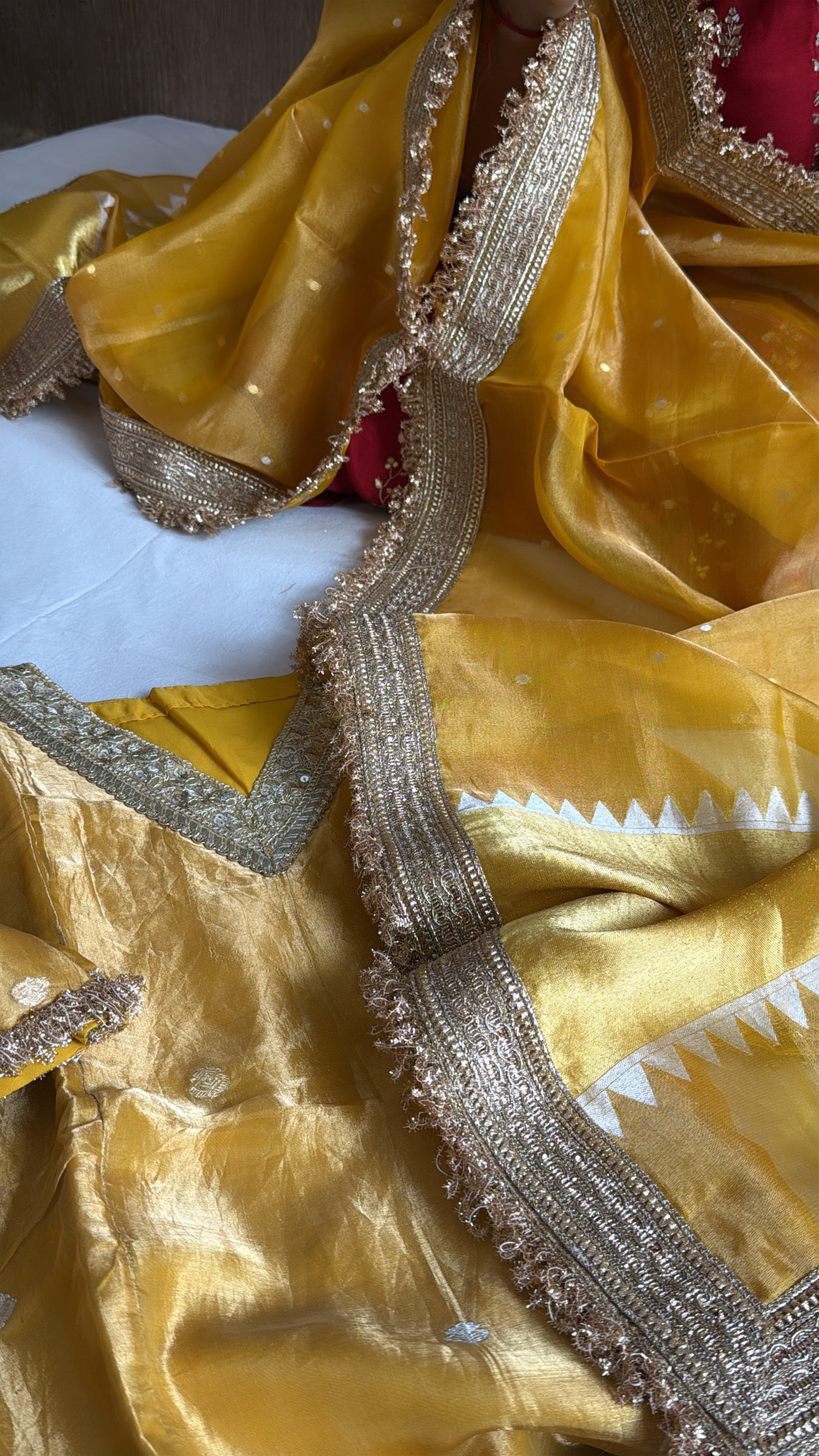 Haldi yellow tissue silk hand embroidered heeramandi semi stitched suit set