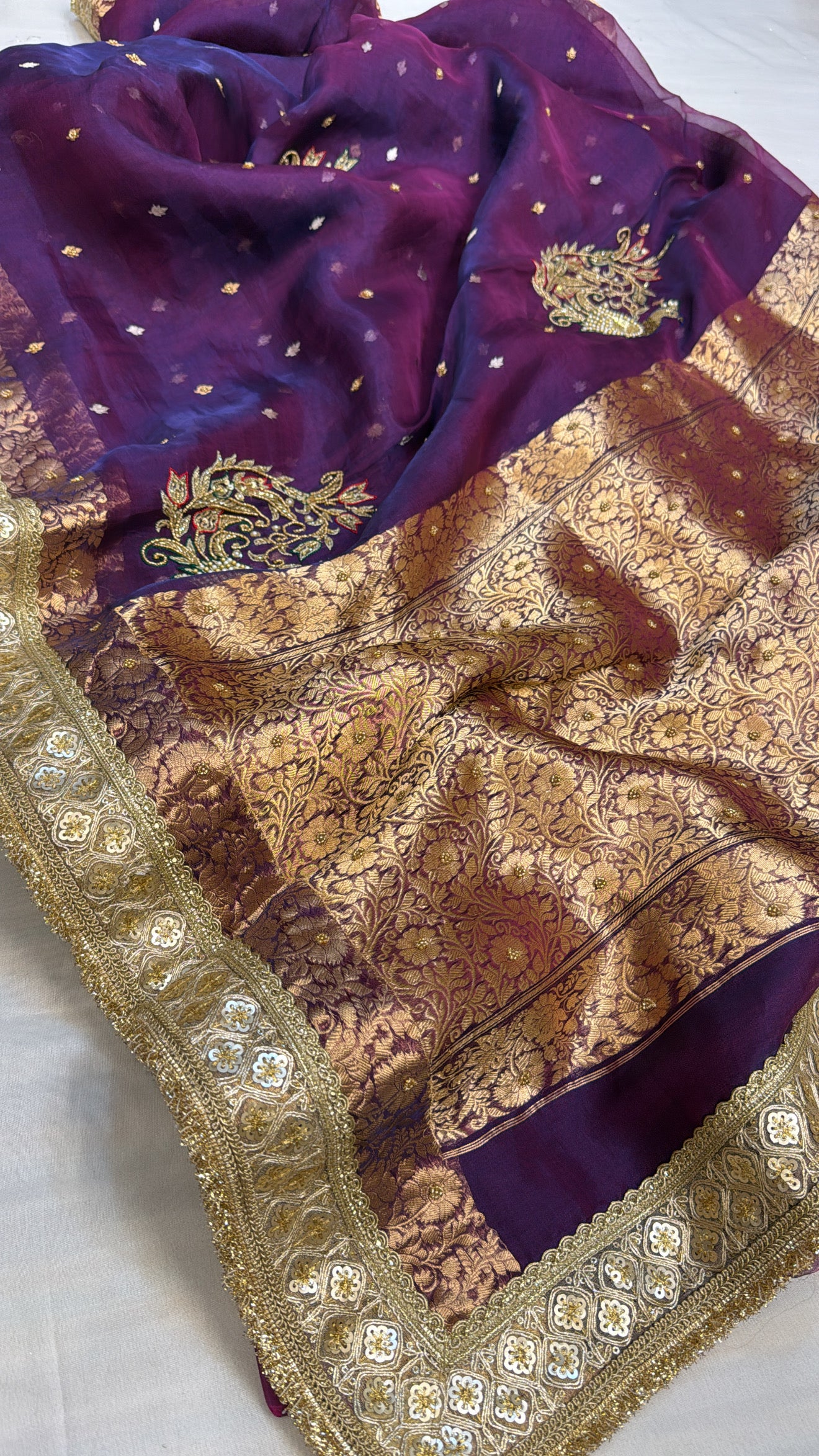 Husn peacock blue-purple dhup chao effect tissue silk hand embroidered saree