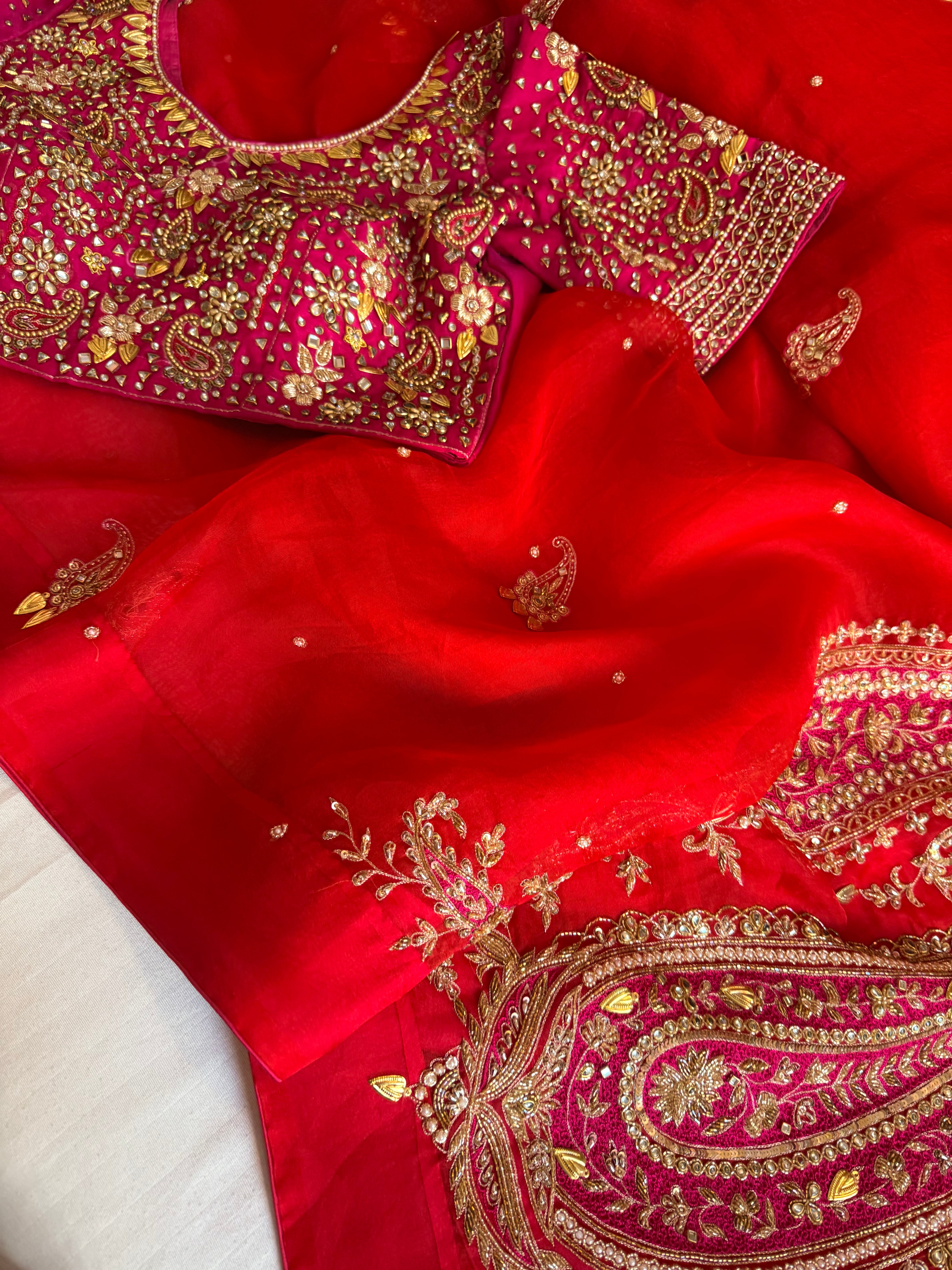 Traditional carry motif - rani and red combination kora silk hand embroidered saree