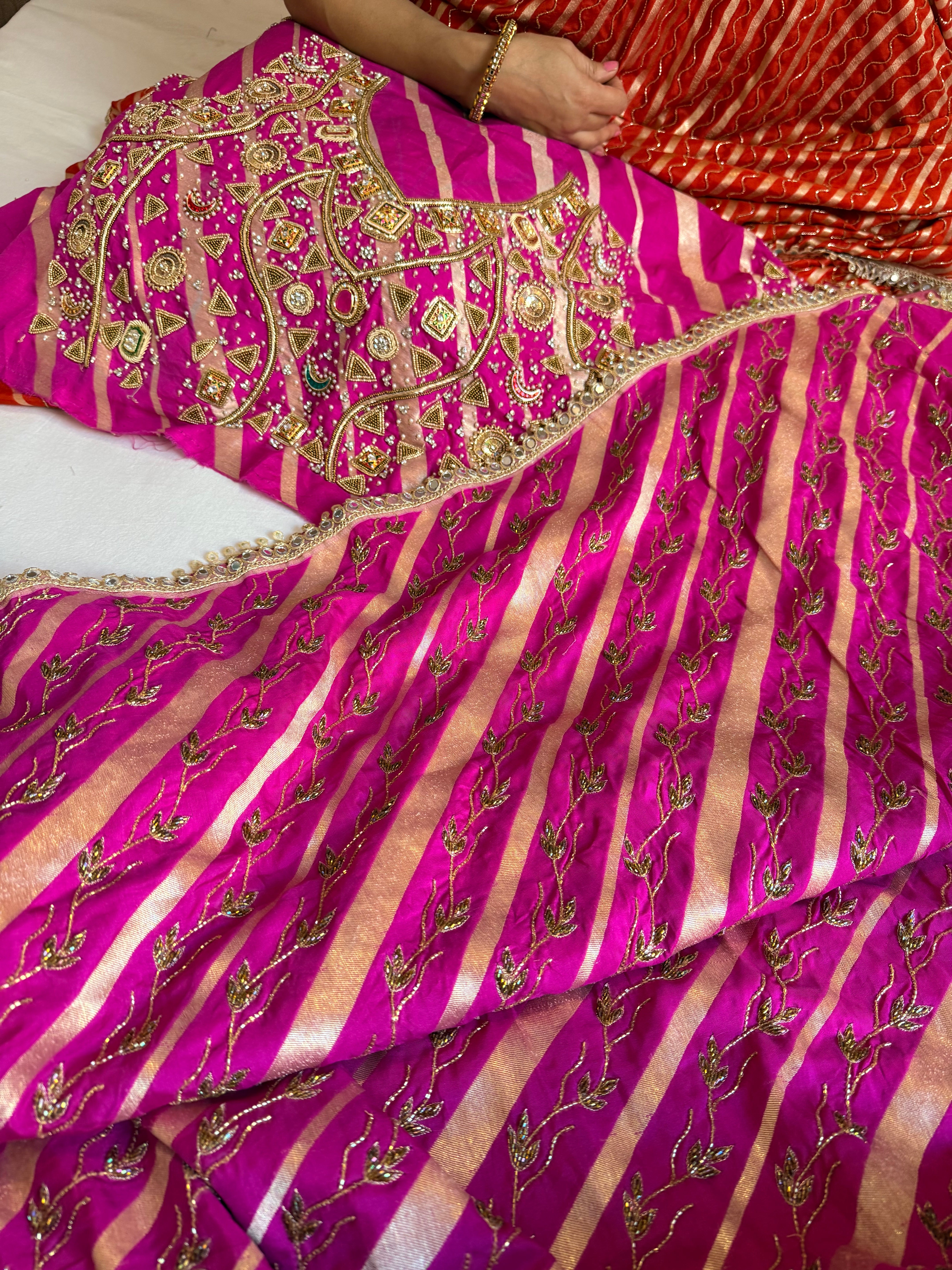 Mashru silk hot pink leheriya hand embroidered saree with bejewelled blouse