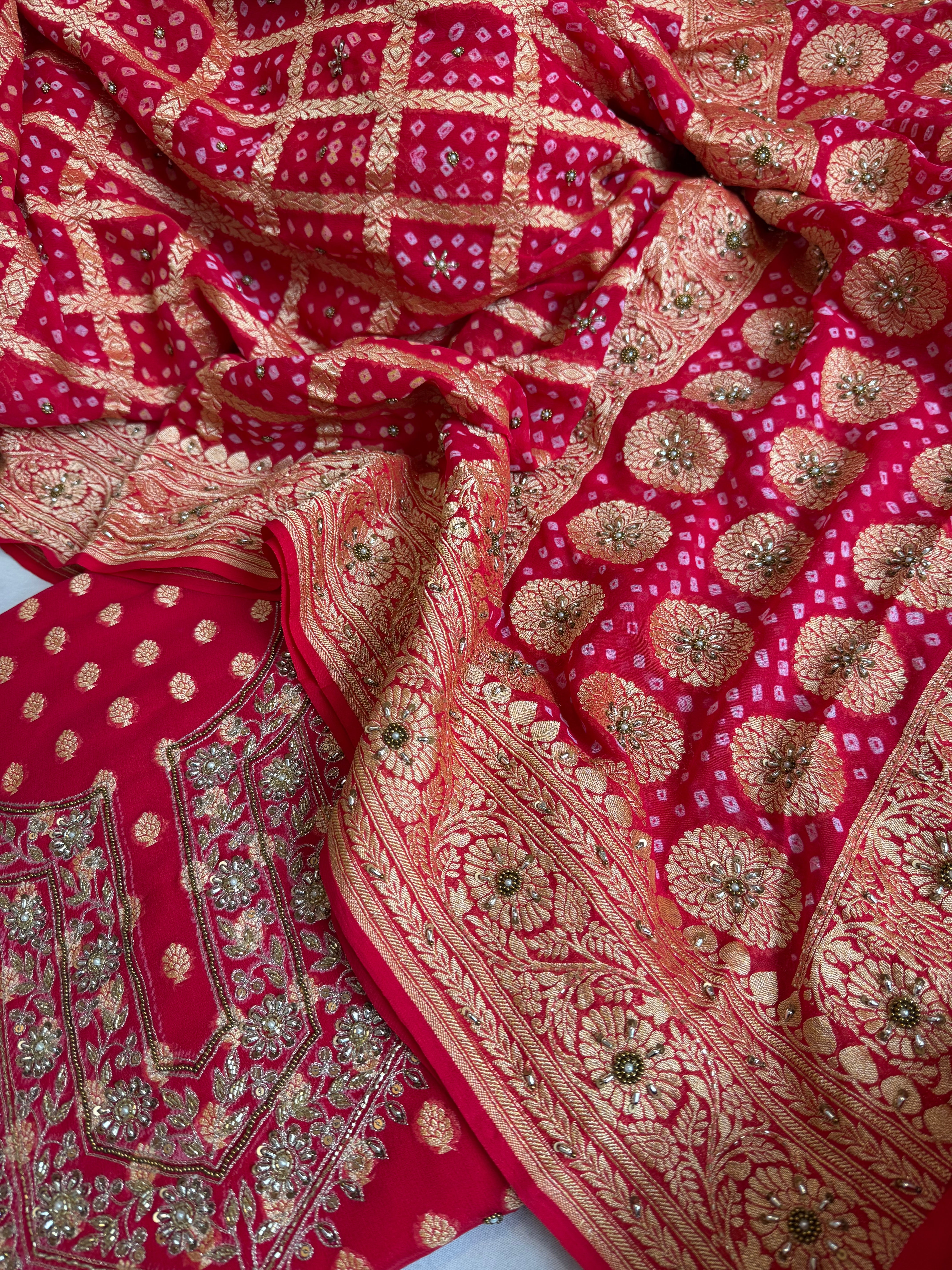 Red rai bandhej kadhwa gorgette hand embroidered suit set