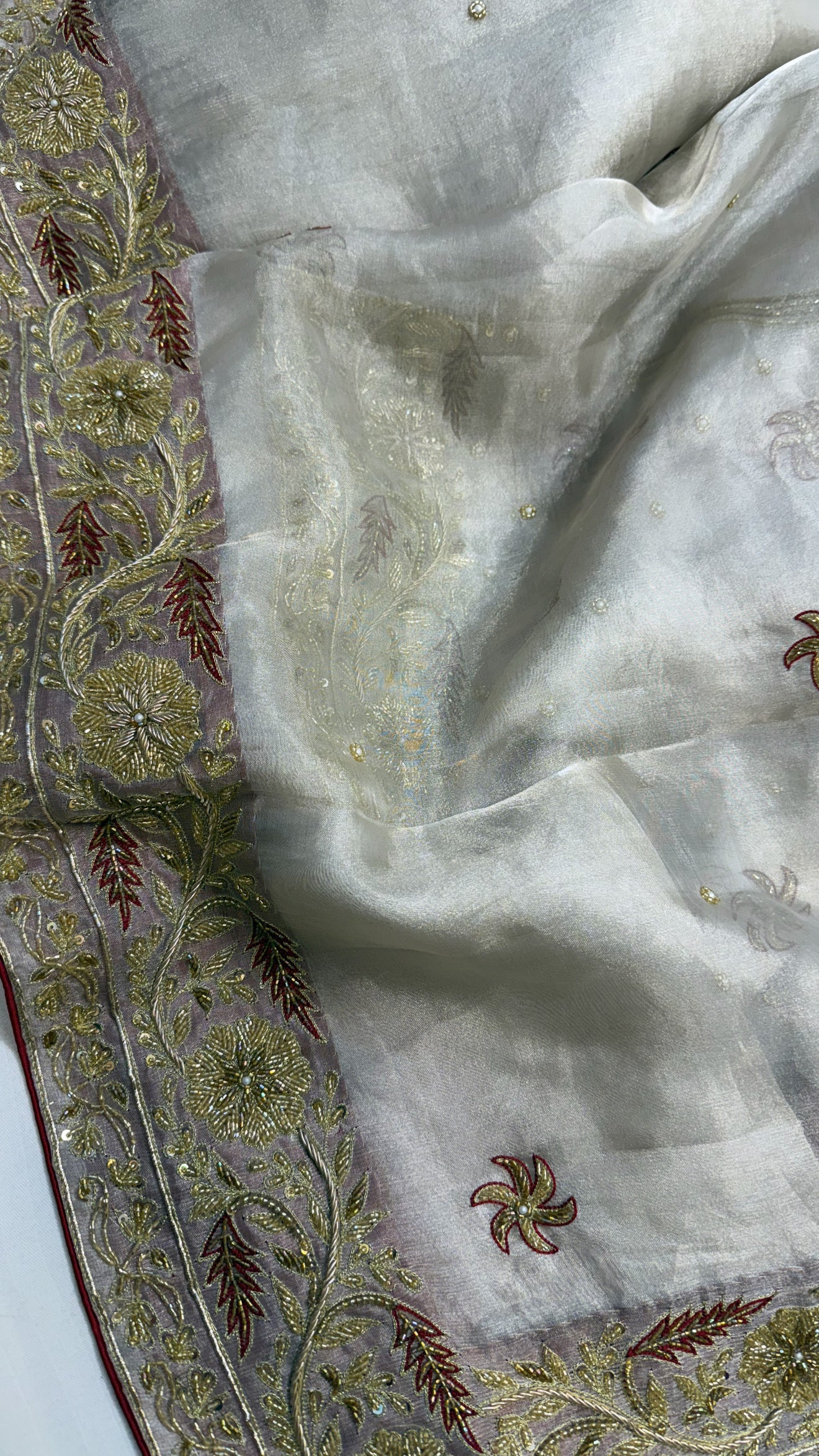 Gulab ki pankhuri husn tissue silk heavy hand embroidered zardozi border saree