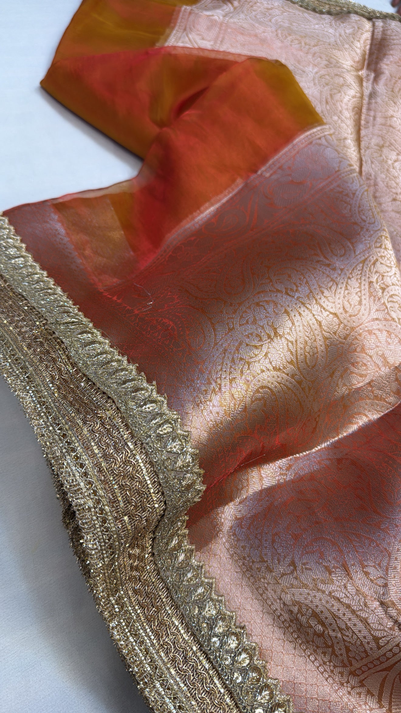 Maharani sunset orange tissue silk saree