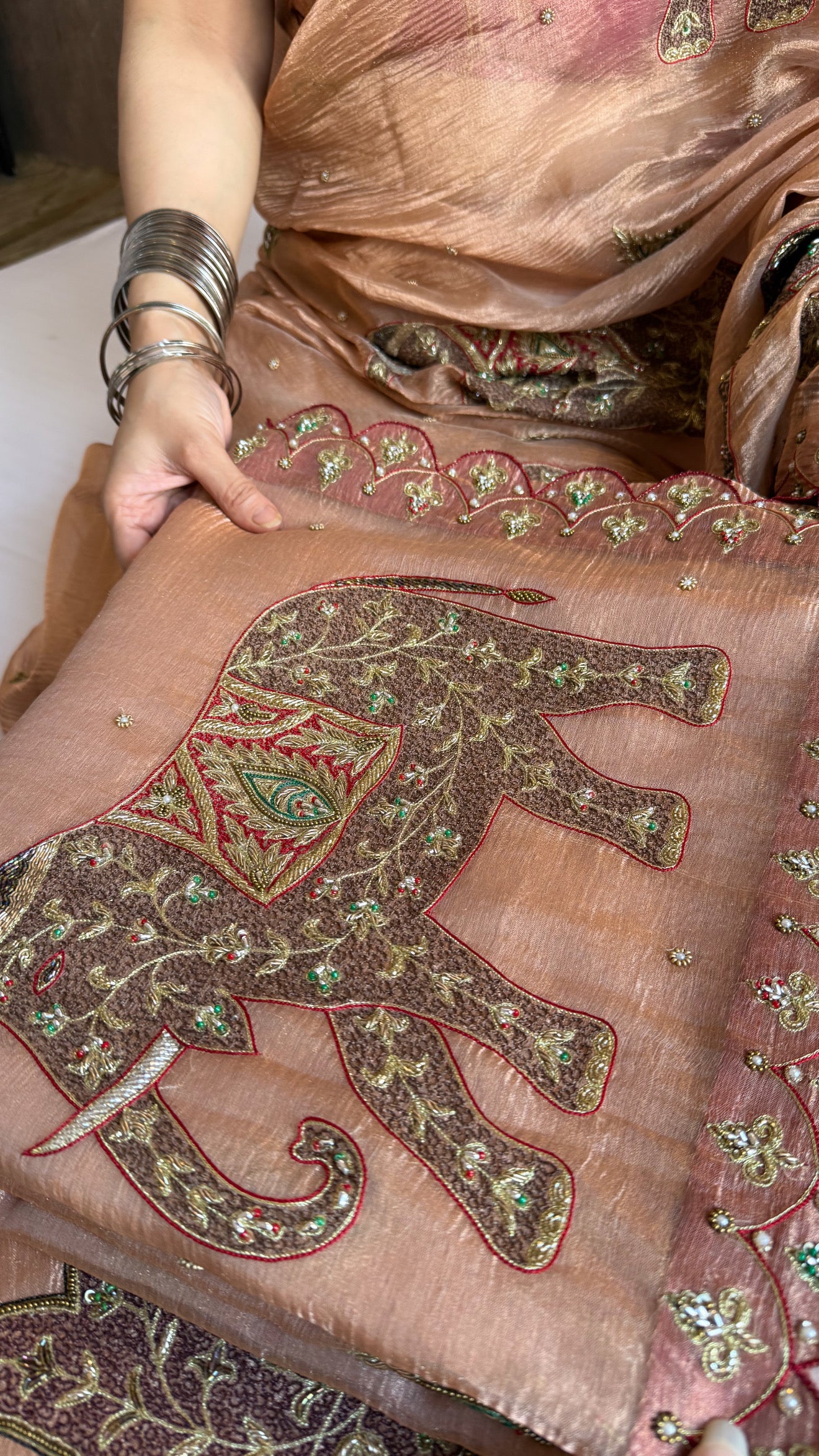 GajGamini crushed copper tissue silk elephant motif heavy hand embroidered meenakari work saree