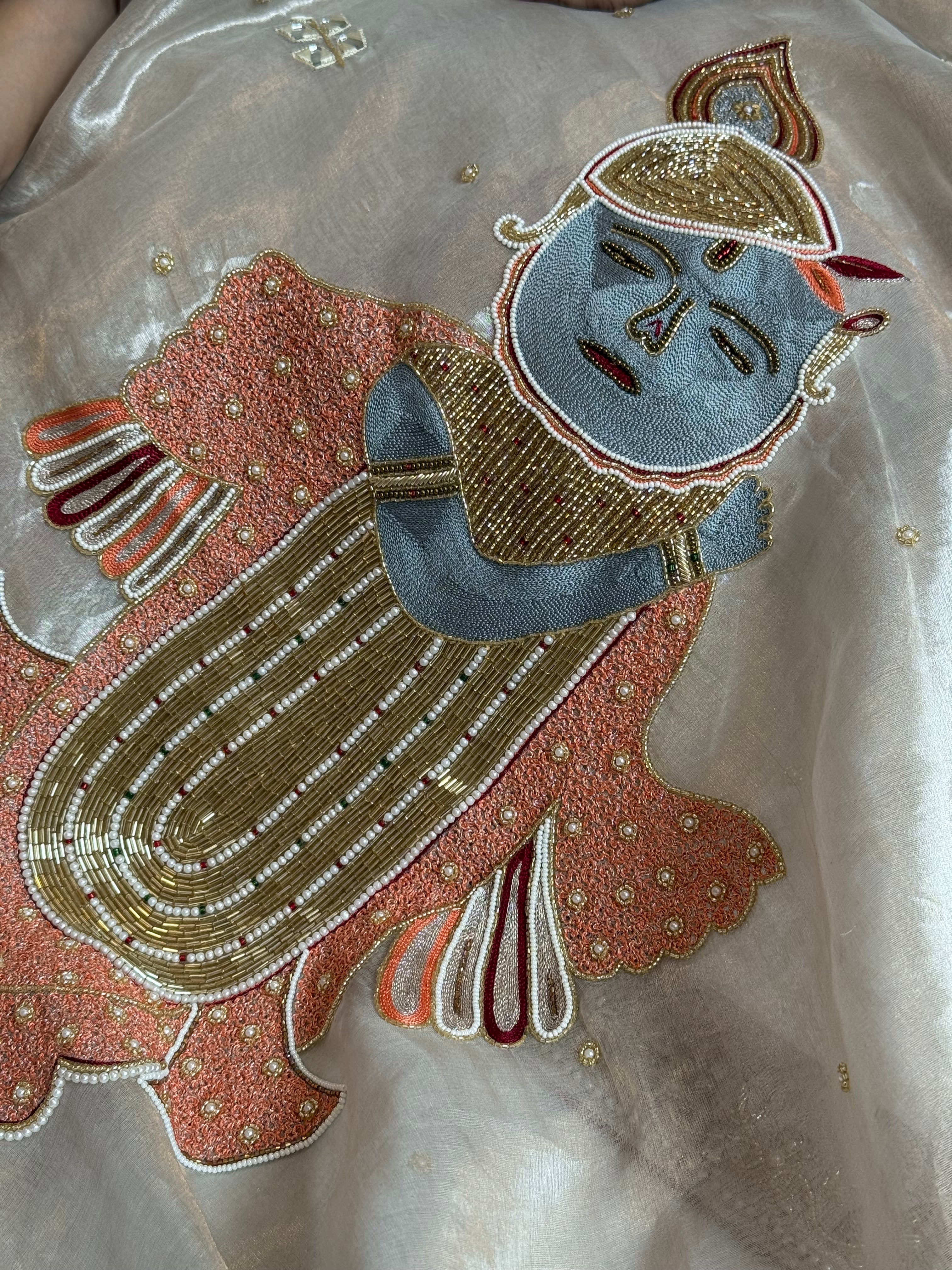 Radhika merchant inspired shreenathji motif diamond tissue silk hand embroidered saree