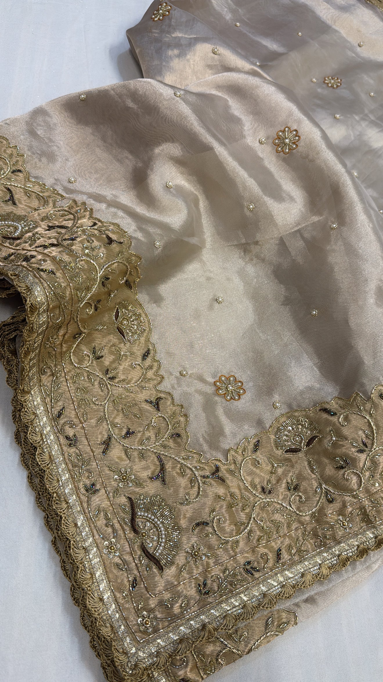 Golden heavy zardozi border diamond tissue silk hand embroidered saree