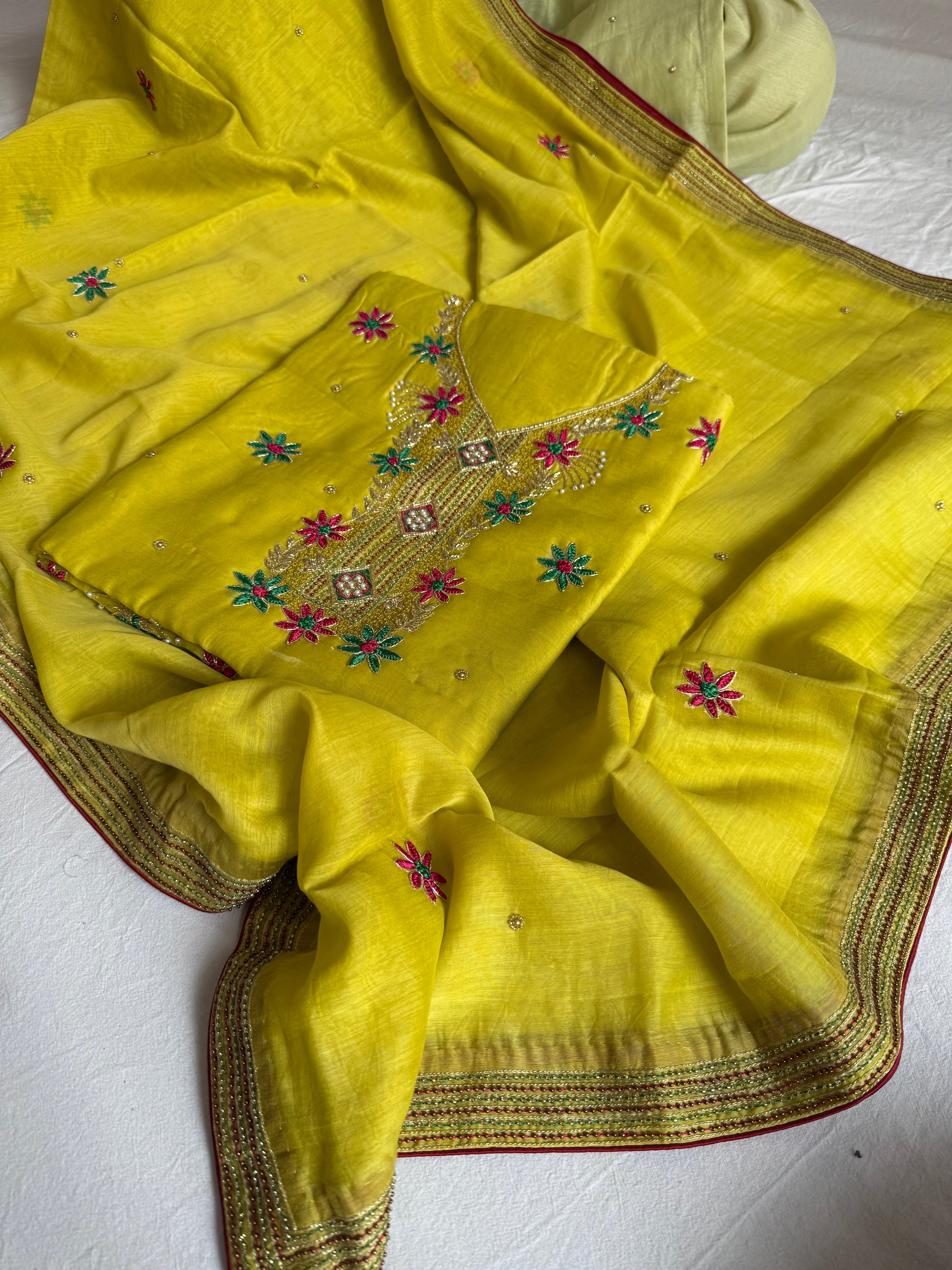 Banarasi formal wear mul cotton lime green cotton hand embroidered kurta paired with mul cotton hand embroidered duppata set