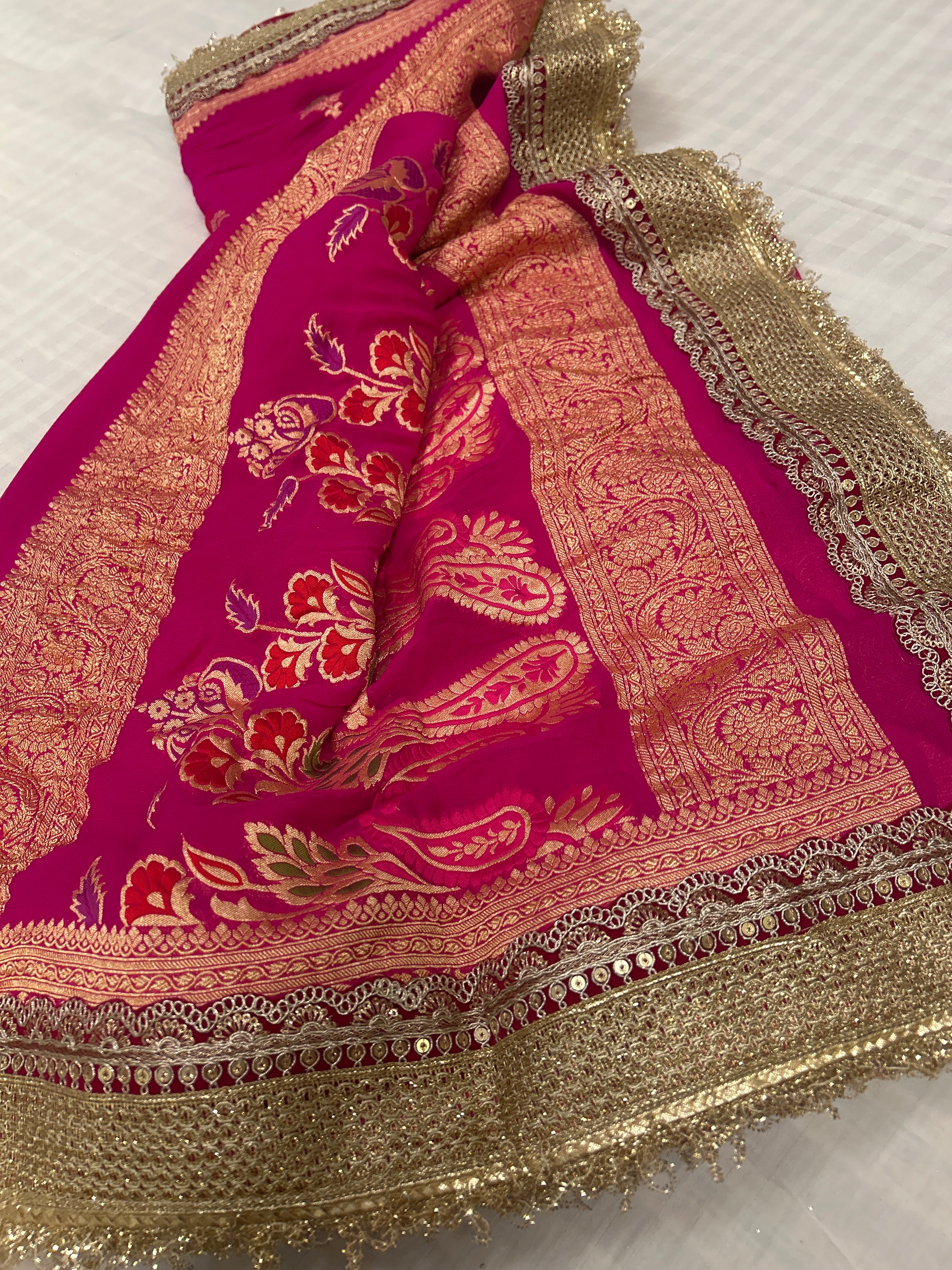 Hot pink meenakari buti georgette saree