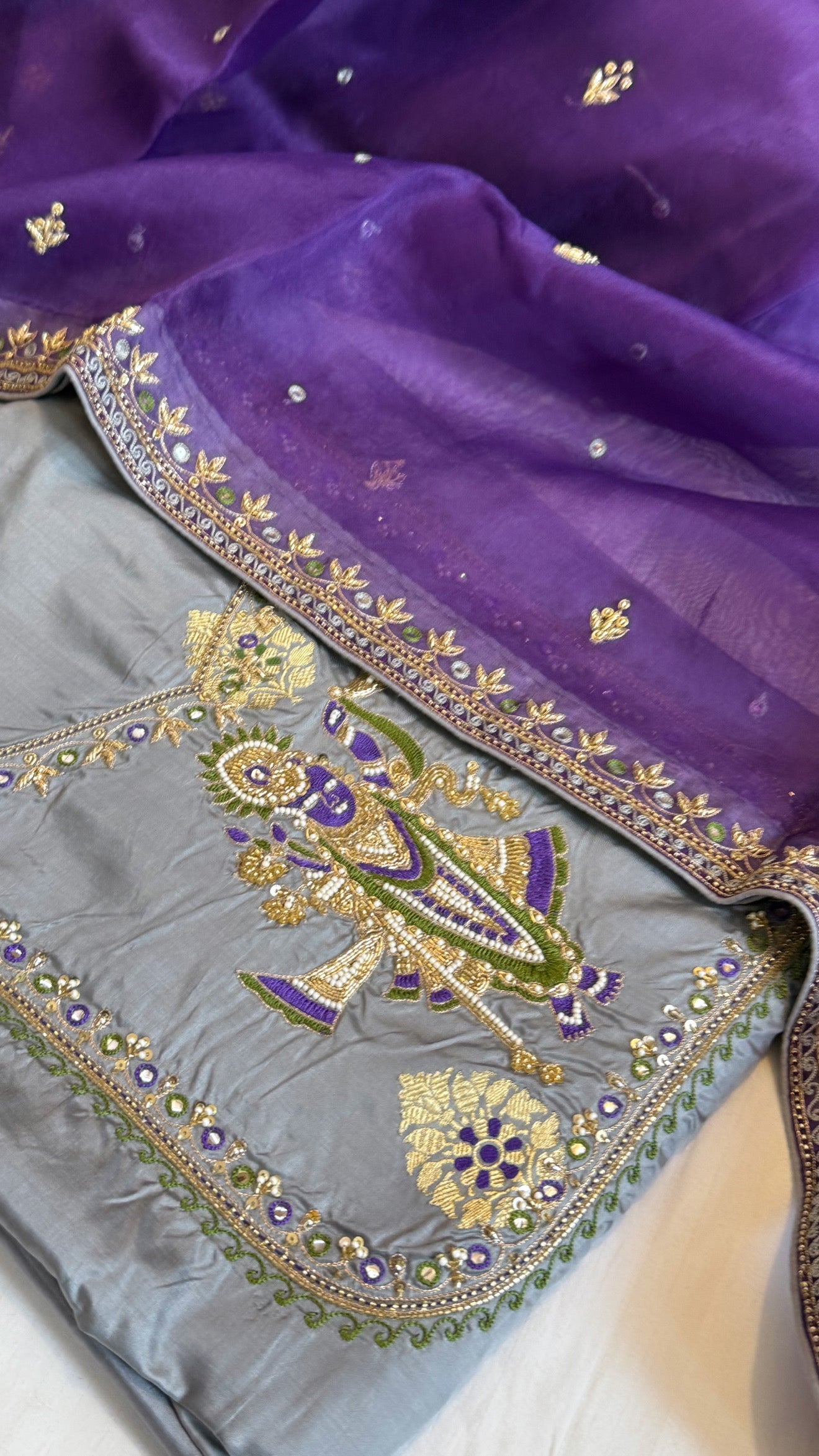 Lavender- grey shade katan silk “shrinathji” motif inspired katan silk hand embroidered suit set