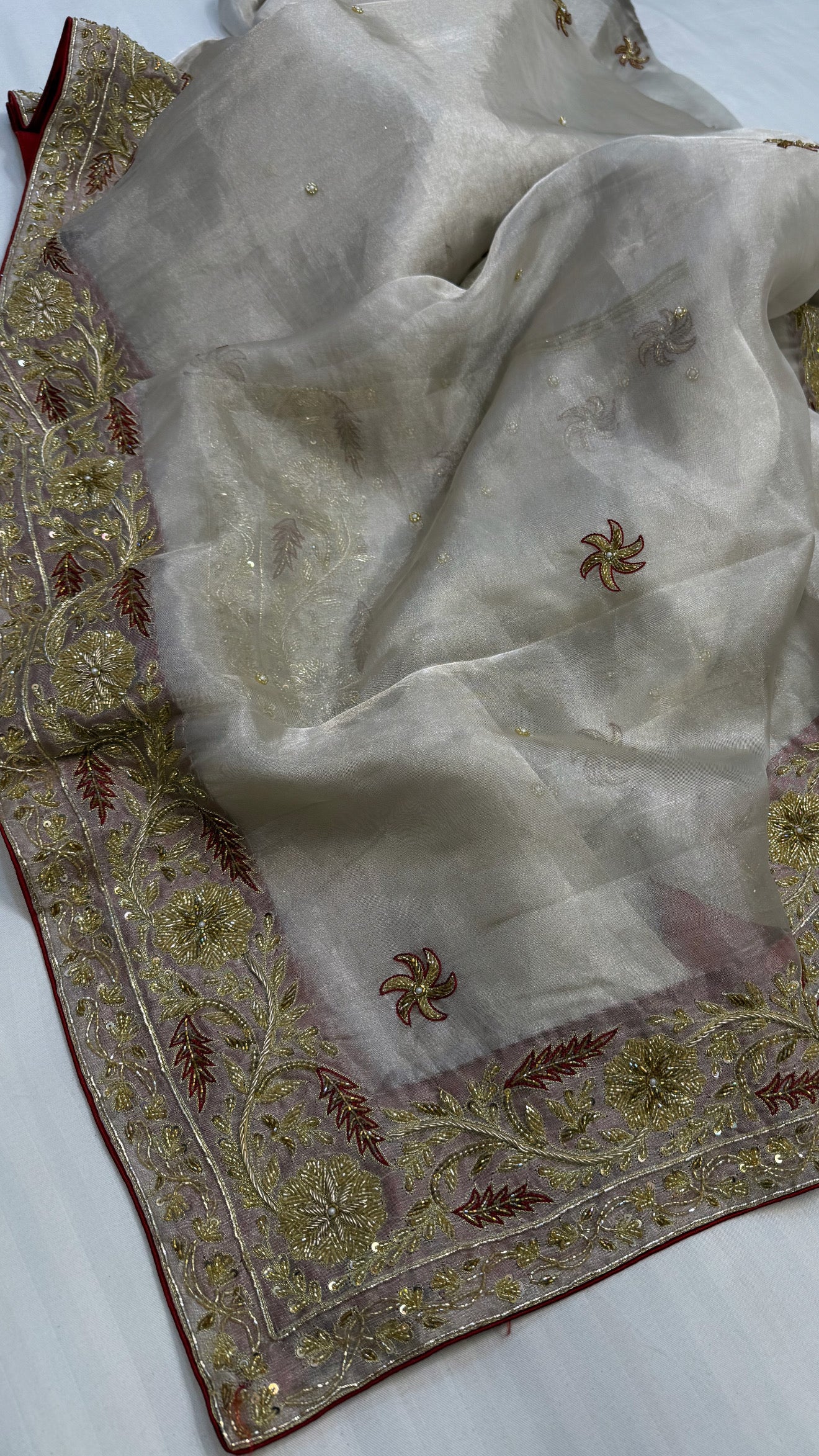 Gulab ki pankhuri husn tissue silk heavy hand embroidered zardozi border saree