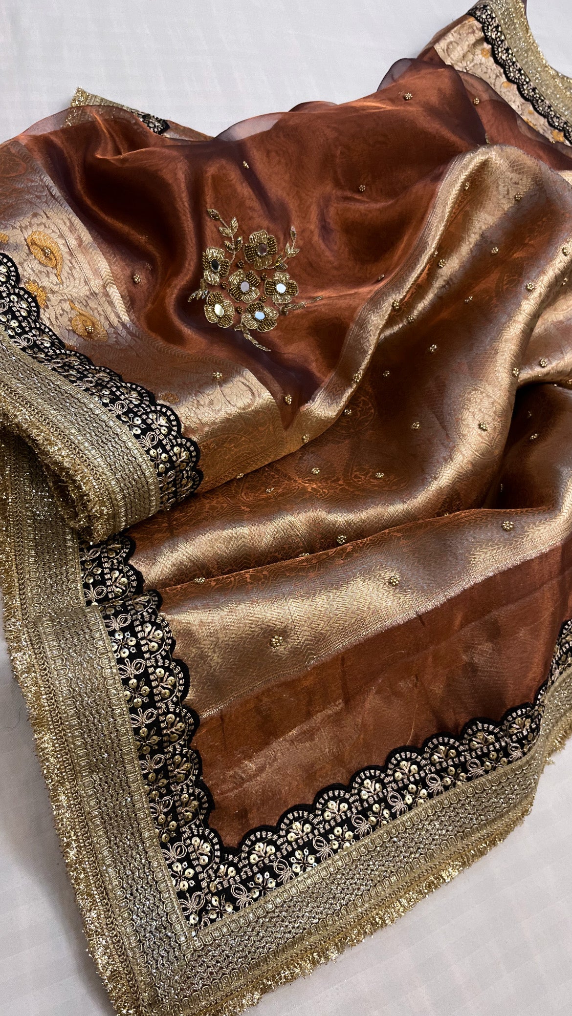 Husn chocolate brown tissue silk hand embroidered saree