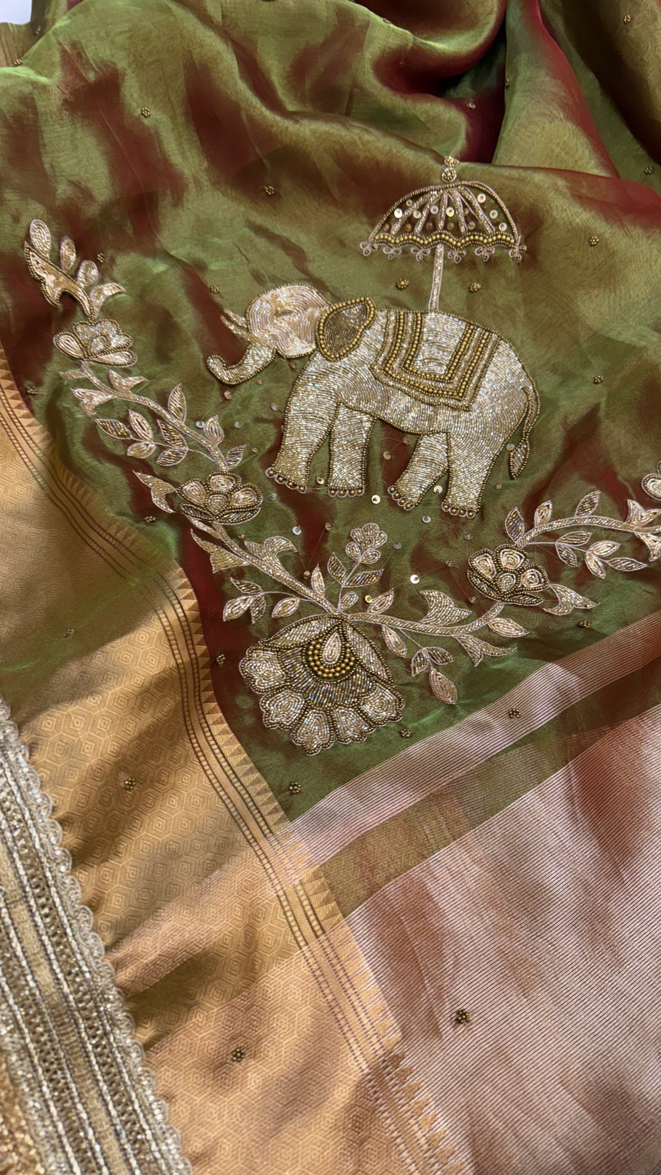 Dulhan ki maa wali sarees - Mehendi green elephant motif hand embroidered tissue saree