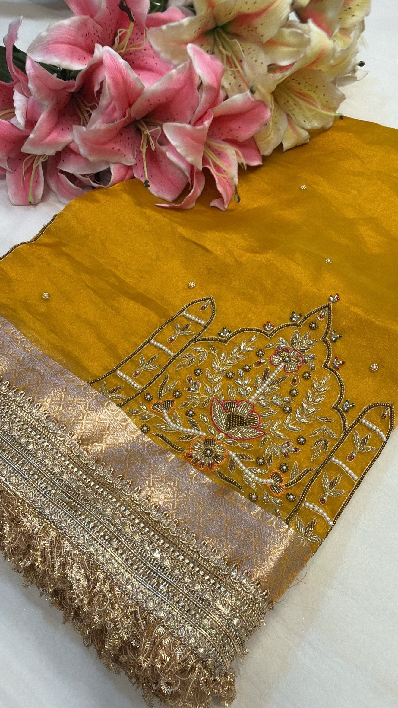 Haldi yellow husn tissue silk hand embroidered kadhwa saree