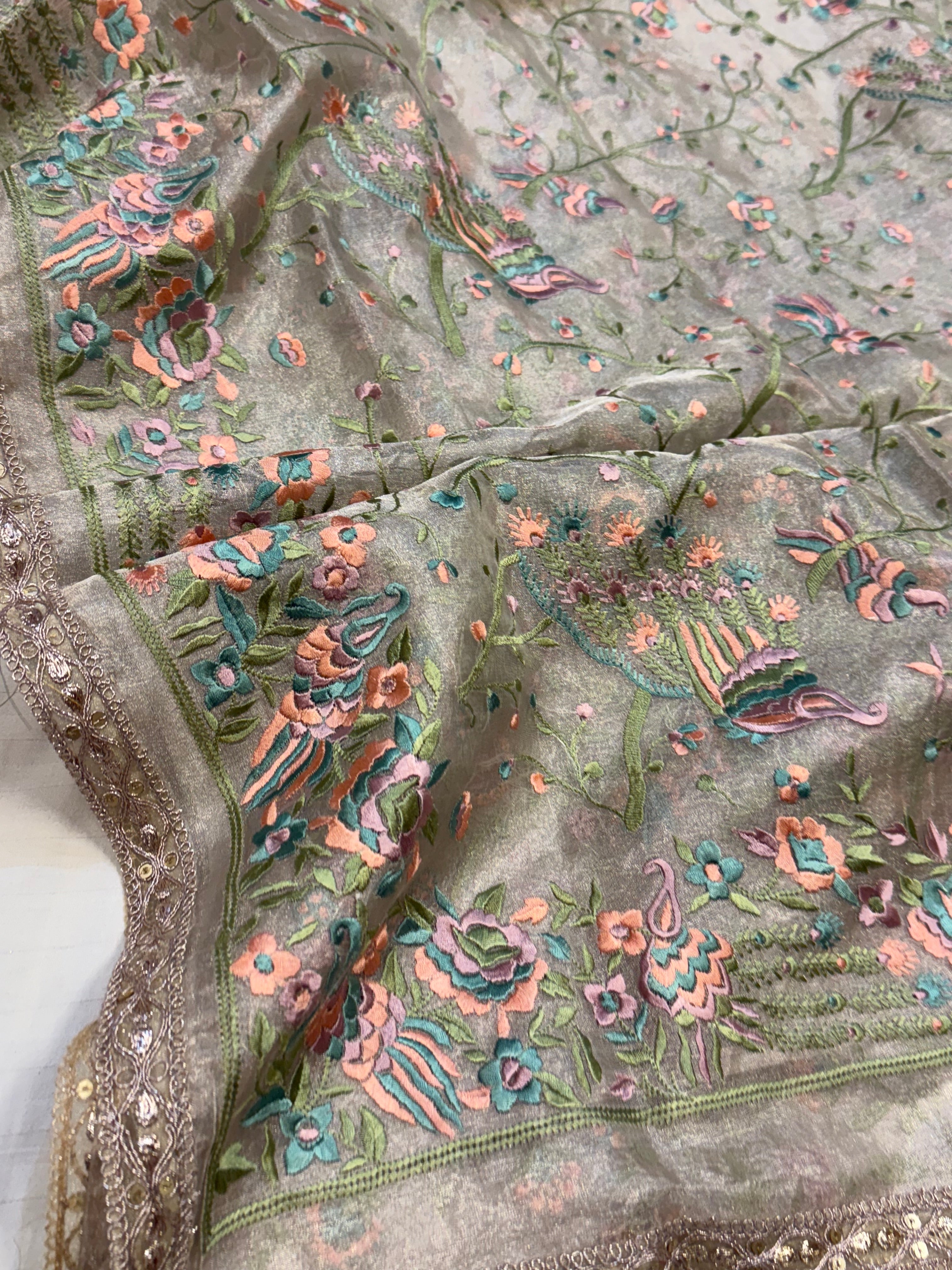 “Parsi gara” inspired tissue silk heavy resham work hand embroidered saree