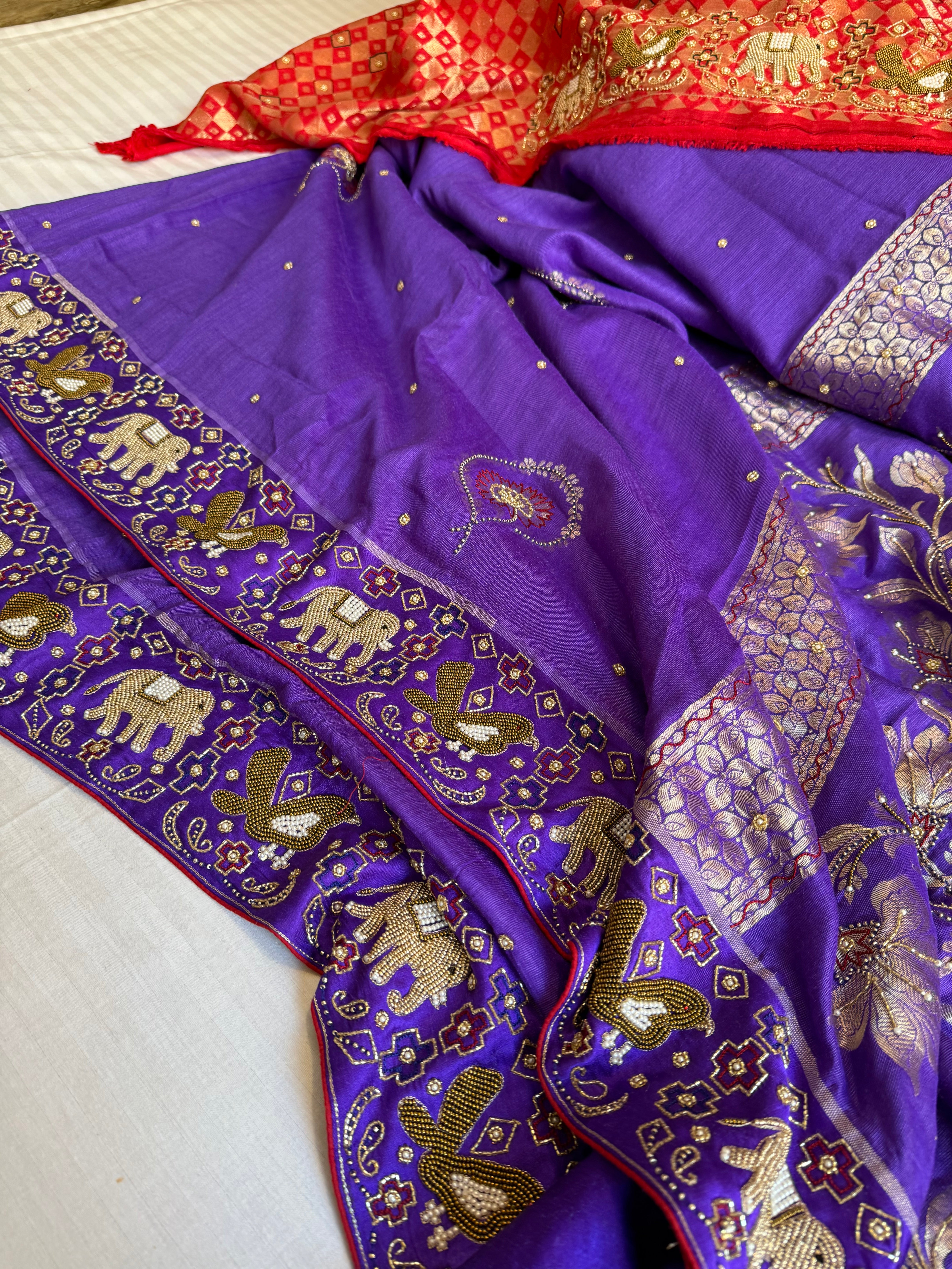 Moonga silk ikkat patola weaving inspired hand embroidered kadhwa saree
