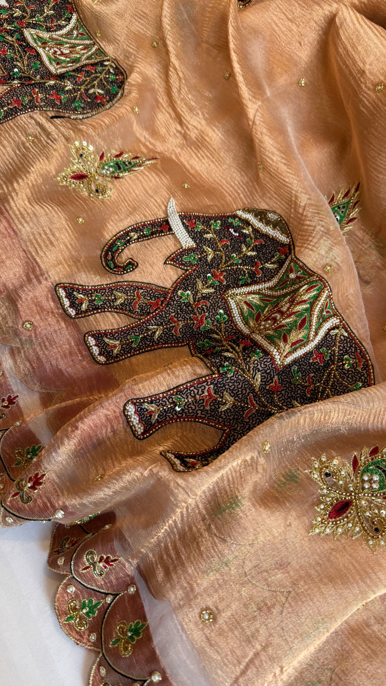 GajGamini copper crushed tissue silk elephant motif heavy hand embroidered saree