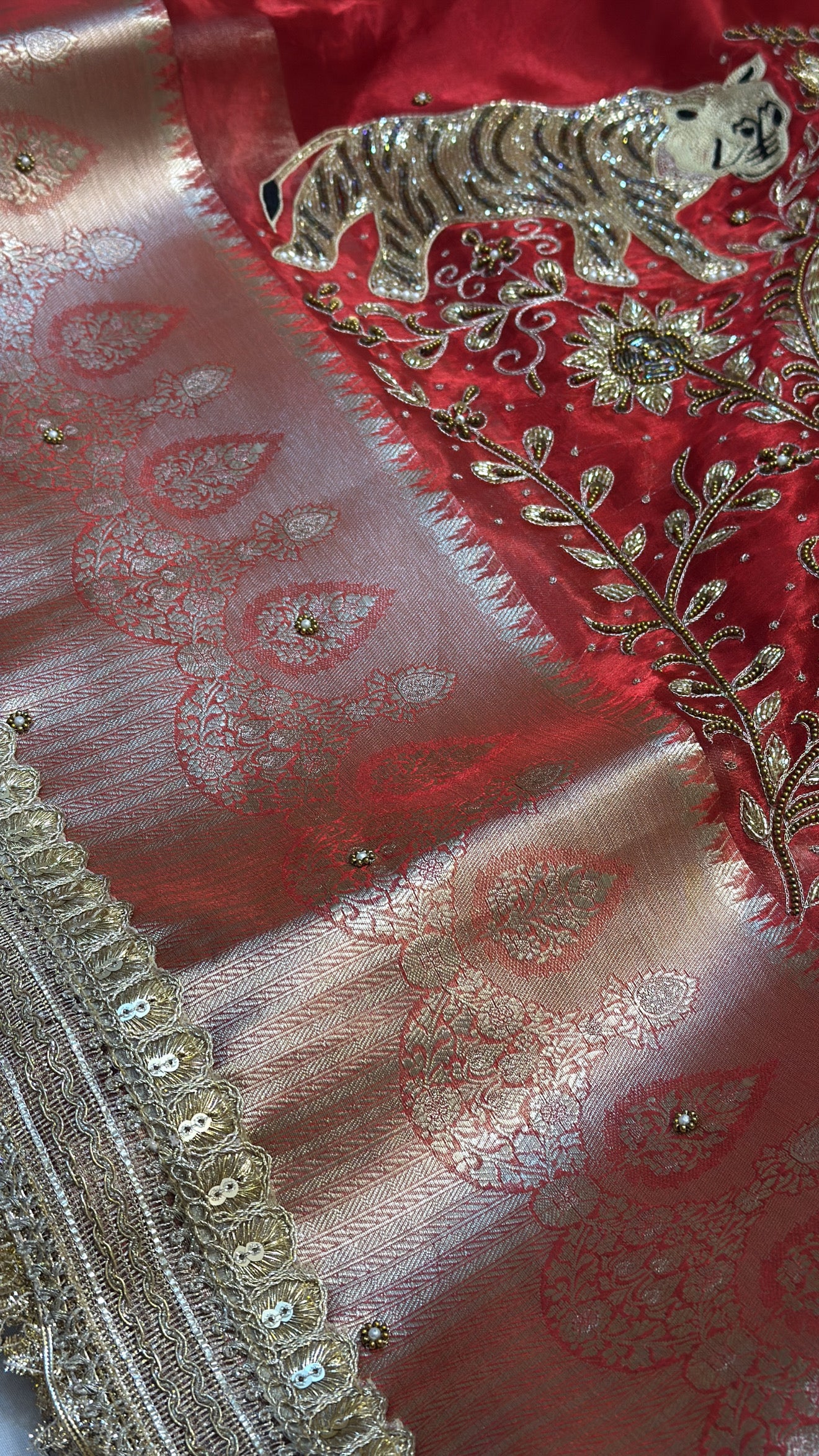 Dulhan ka joda husn red tissue silk hand embroidered saree