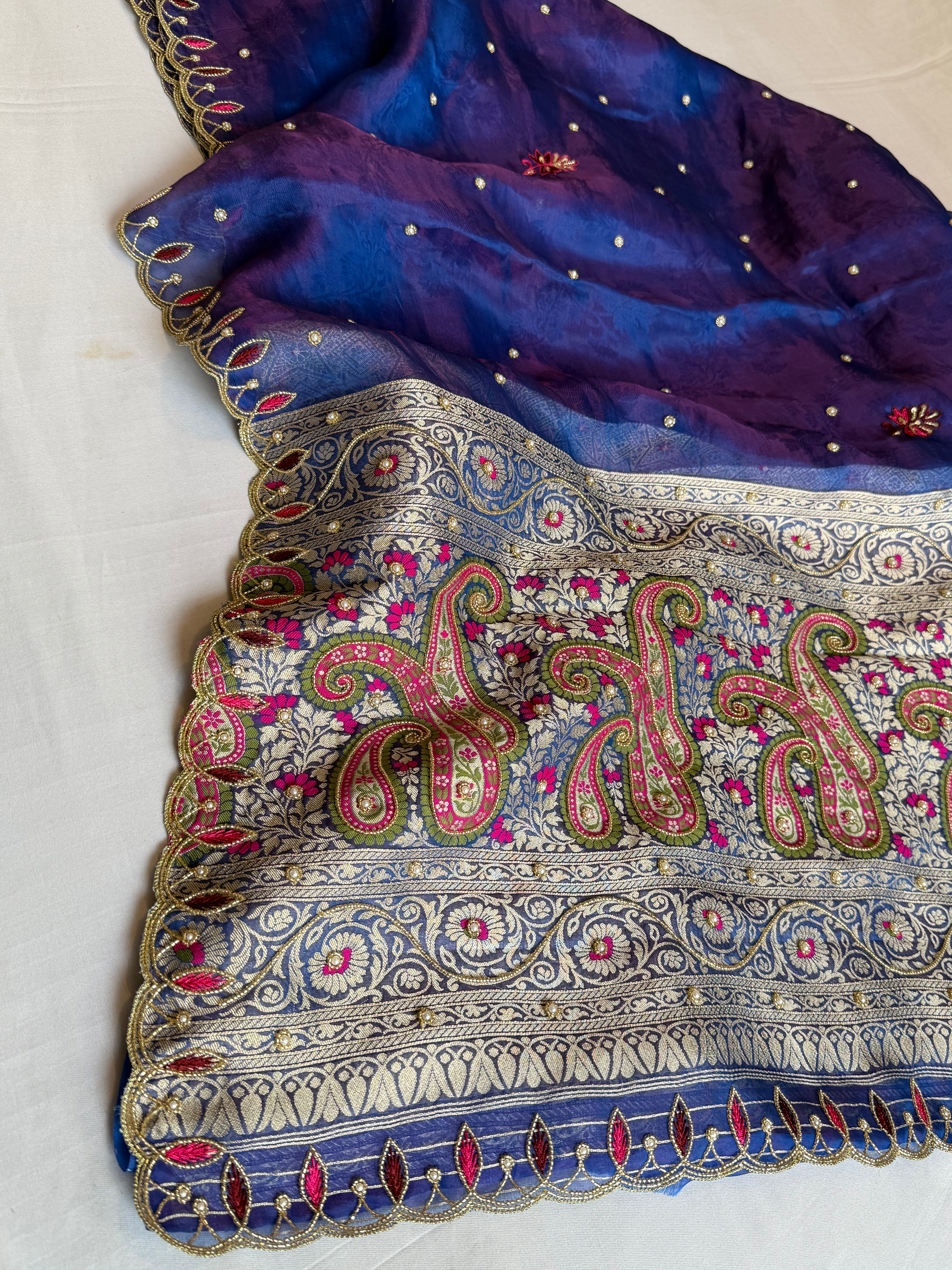 Electric midnight blue dhup chao effect meenakari tissue tanchoi jamevar pallu hand embroidered saree