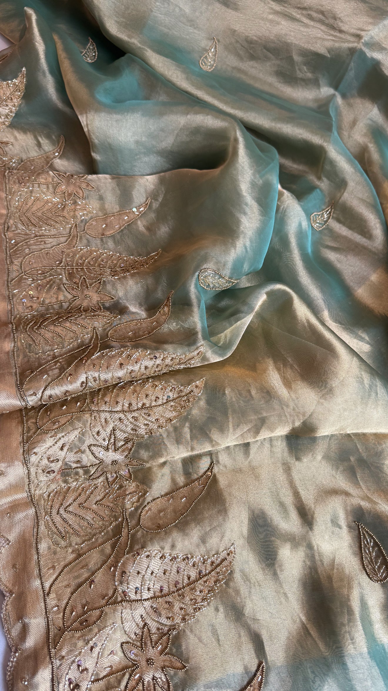 Husn candy green tissue silk heavy hand embroidered saree