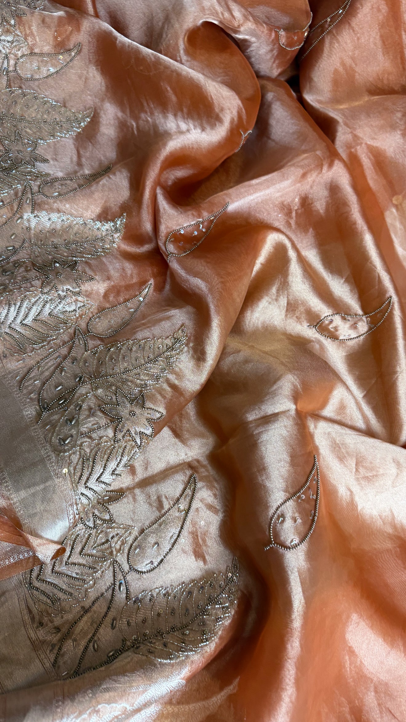 Husn tangerine red tissue silk heavy hand embroidered saree